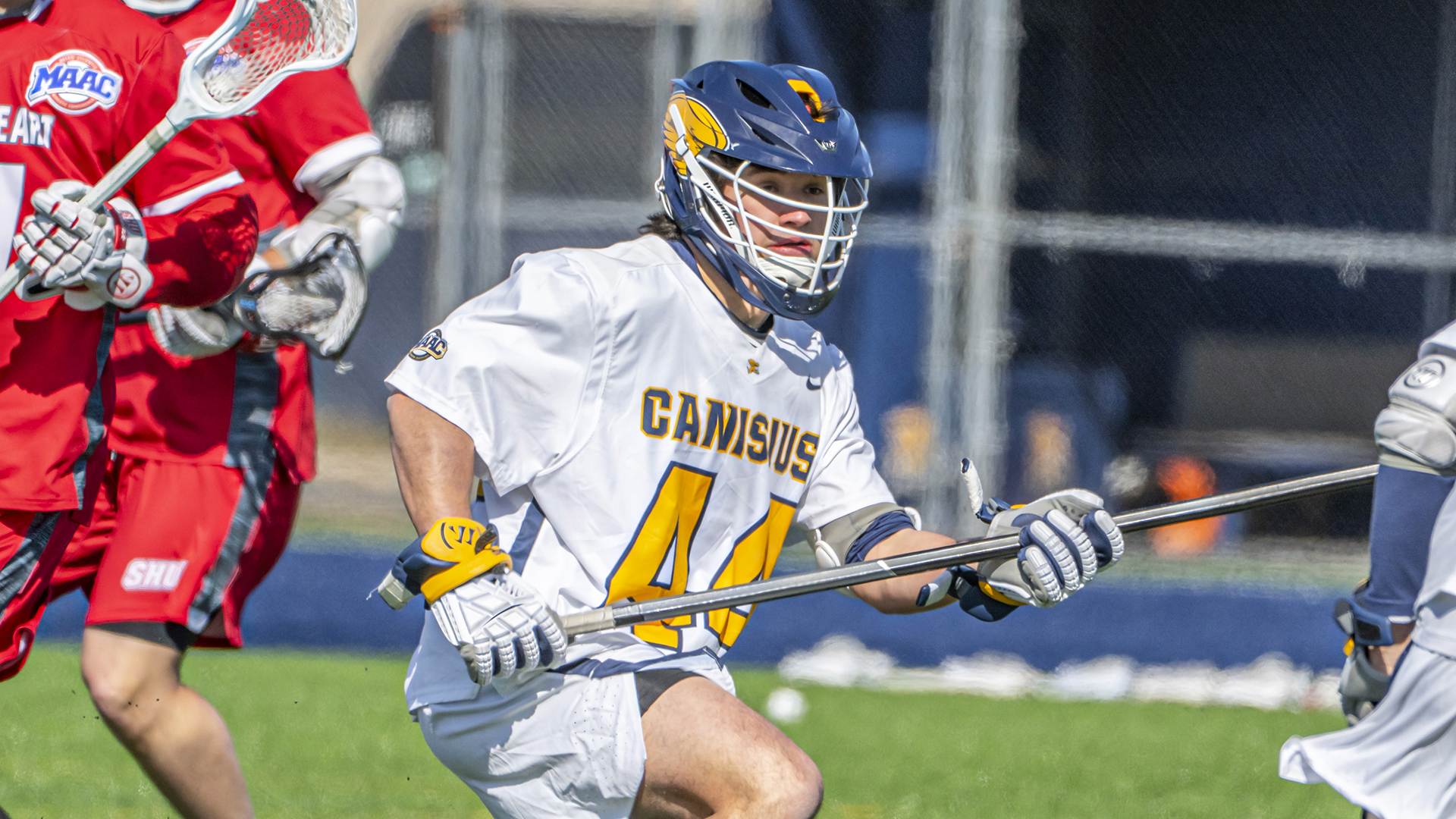Canisius defenseman Hunter Roy is shown play defense during game action versus Sacred Heart at the Demske Sports Complex on March 8, 2025