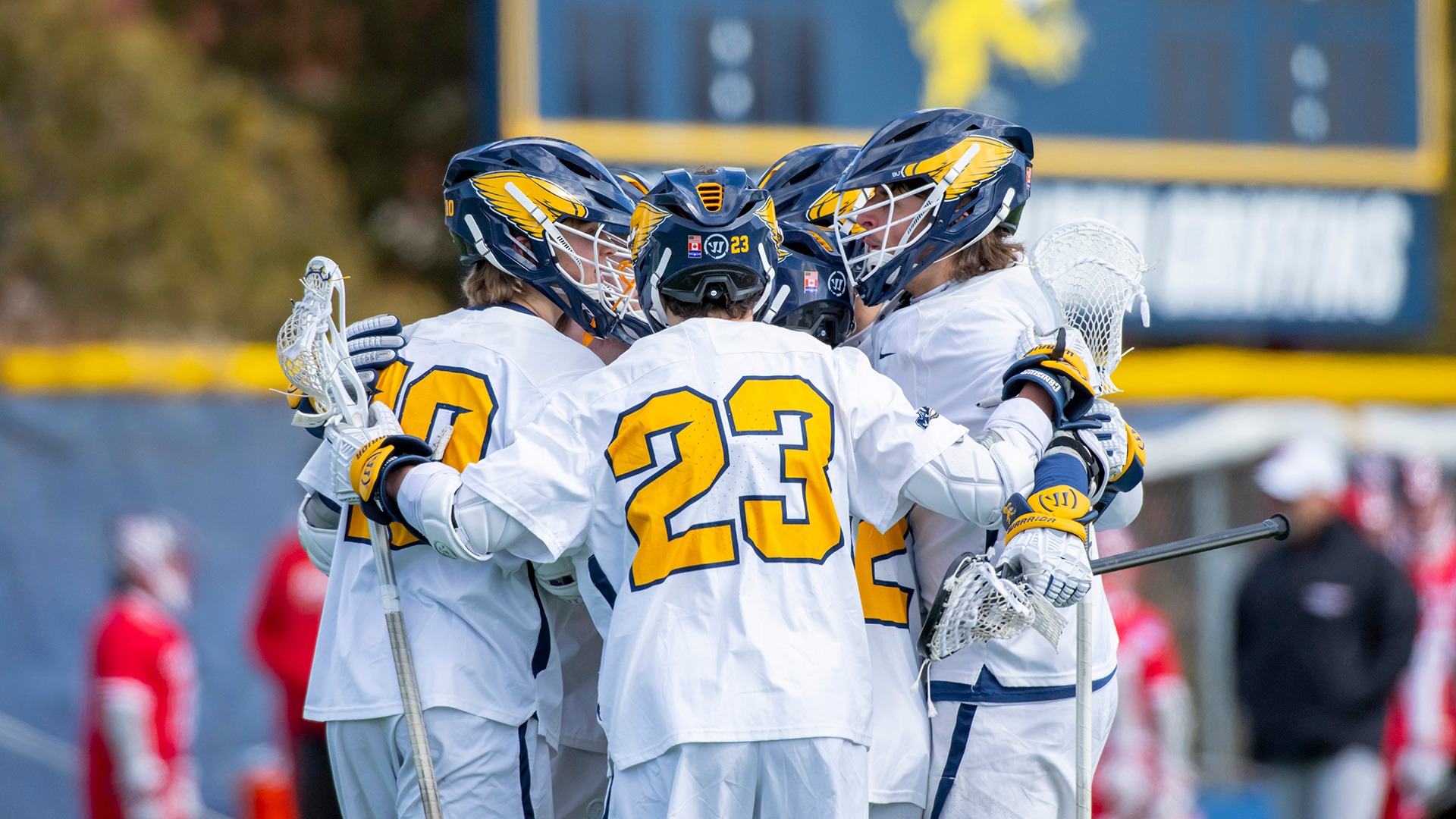 Members of the Canisius men's lacrosse team huddle following a goal against Sacred Heart at the Demske Sports Complex on March 8, 2025