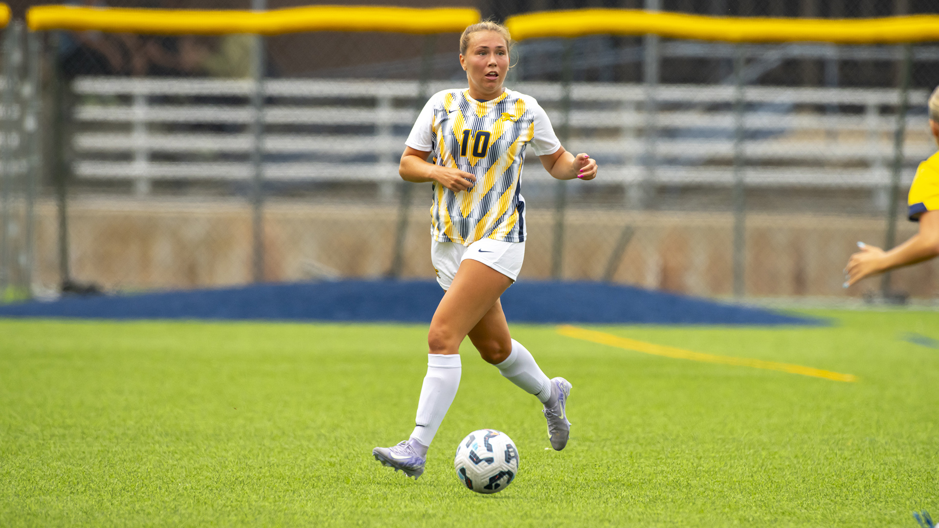 Meghan Joerger plays the ball during game action versus Merrimack at the Demske Sports Complex on Sept. 13, 2025
