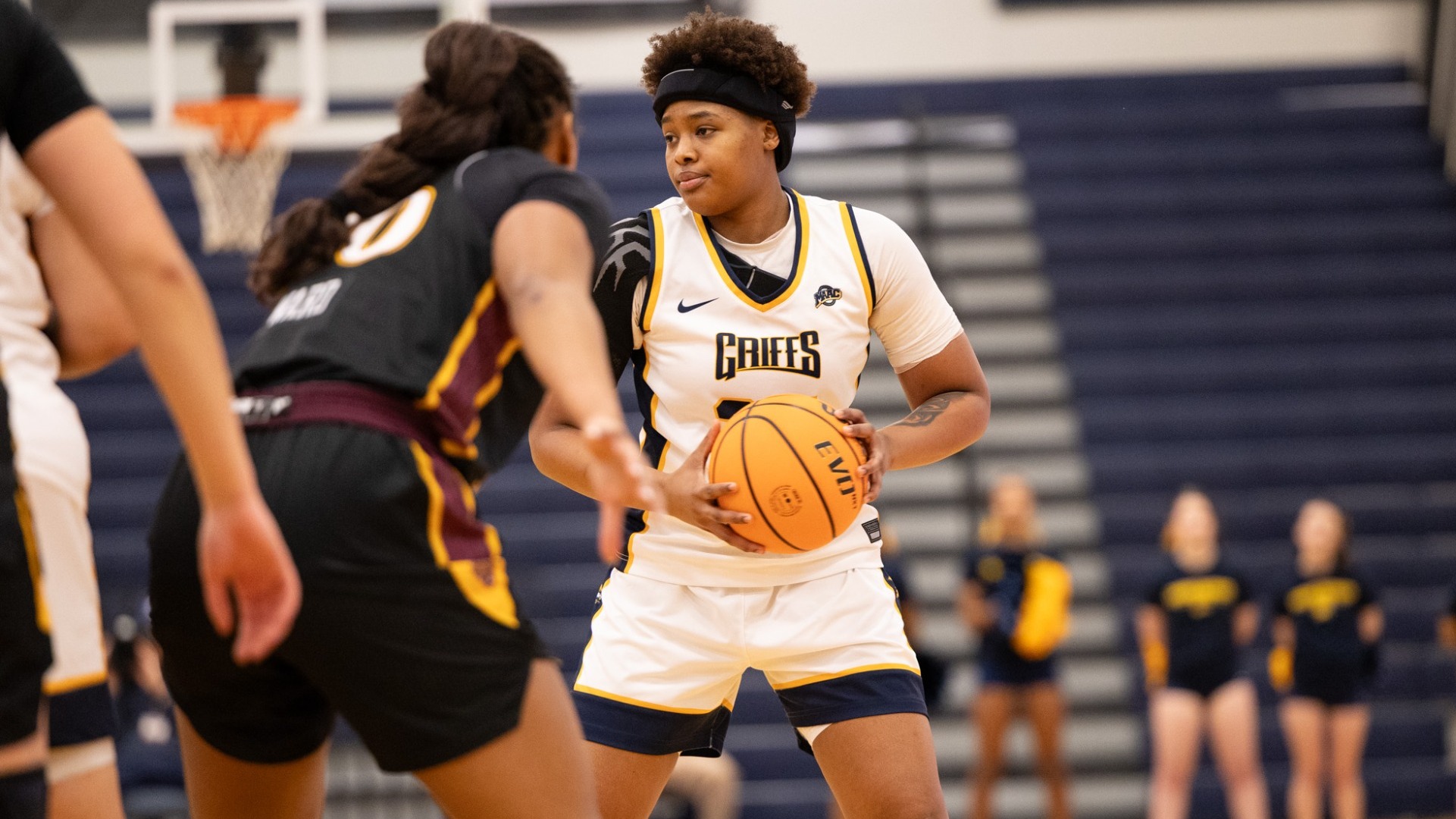 Shariah Gailes holds the ball vs Iona at the Koessler Athletic Center in Buffalo, N.Y.