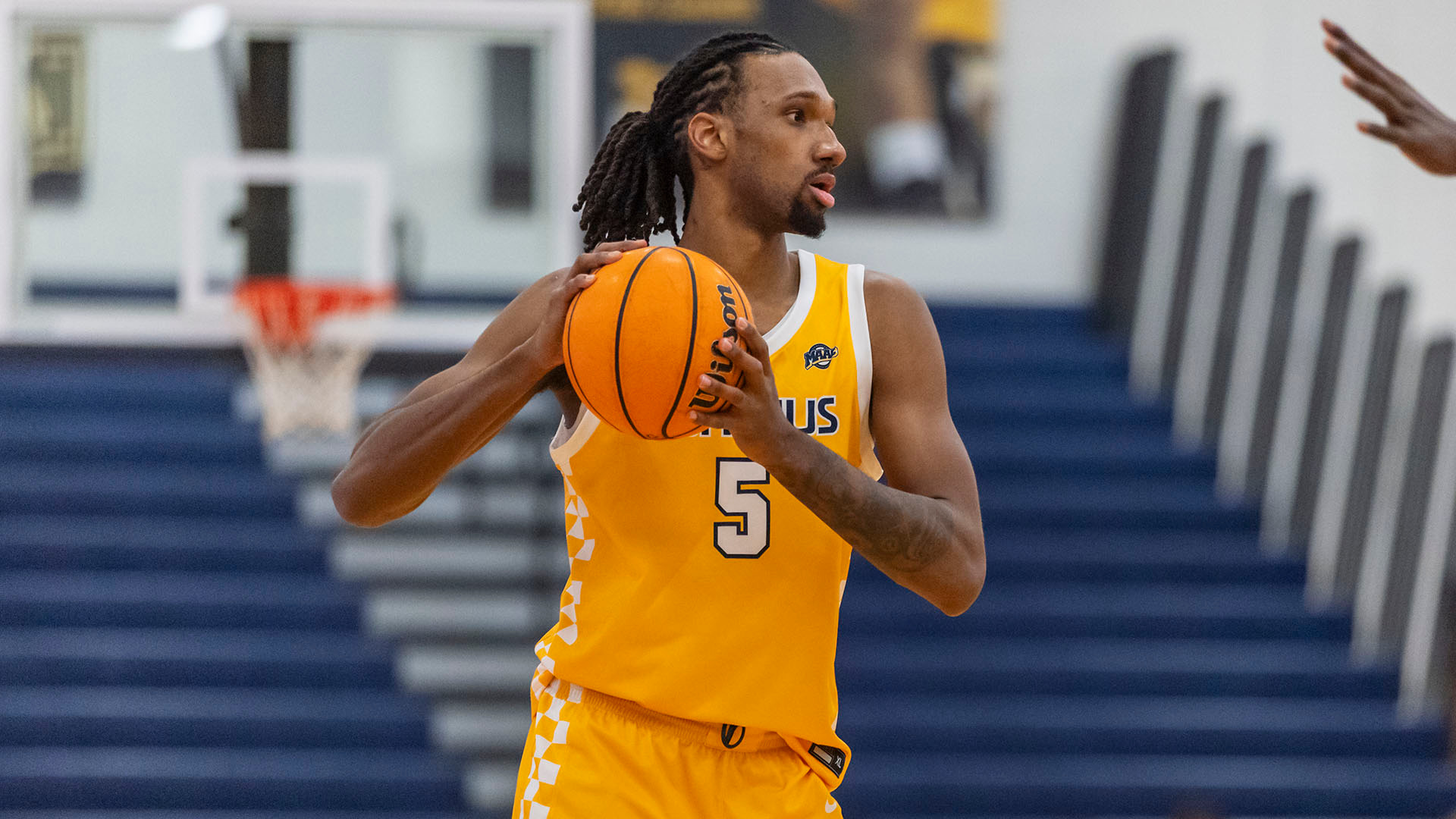 Myles Wilmoth looks to make a pass during a home game against Sacred Heart on Jan. 4, 2026.