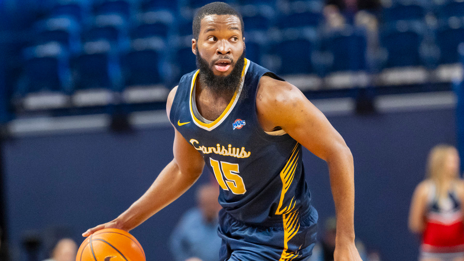 Mike Evbagharu looks to make a pass in the first half of a road game at Duquesne on Dec. 22, 2025.