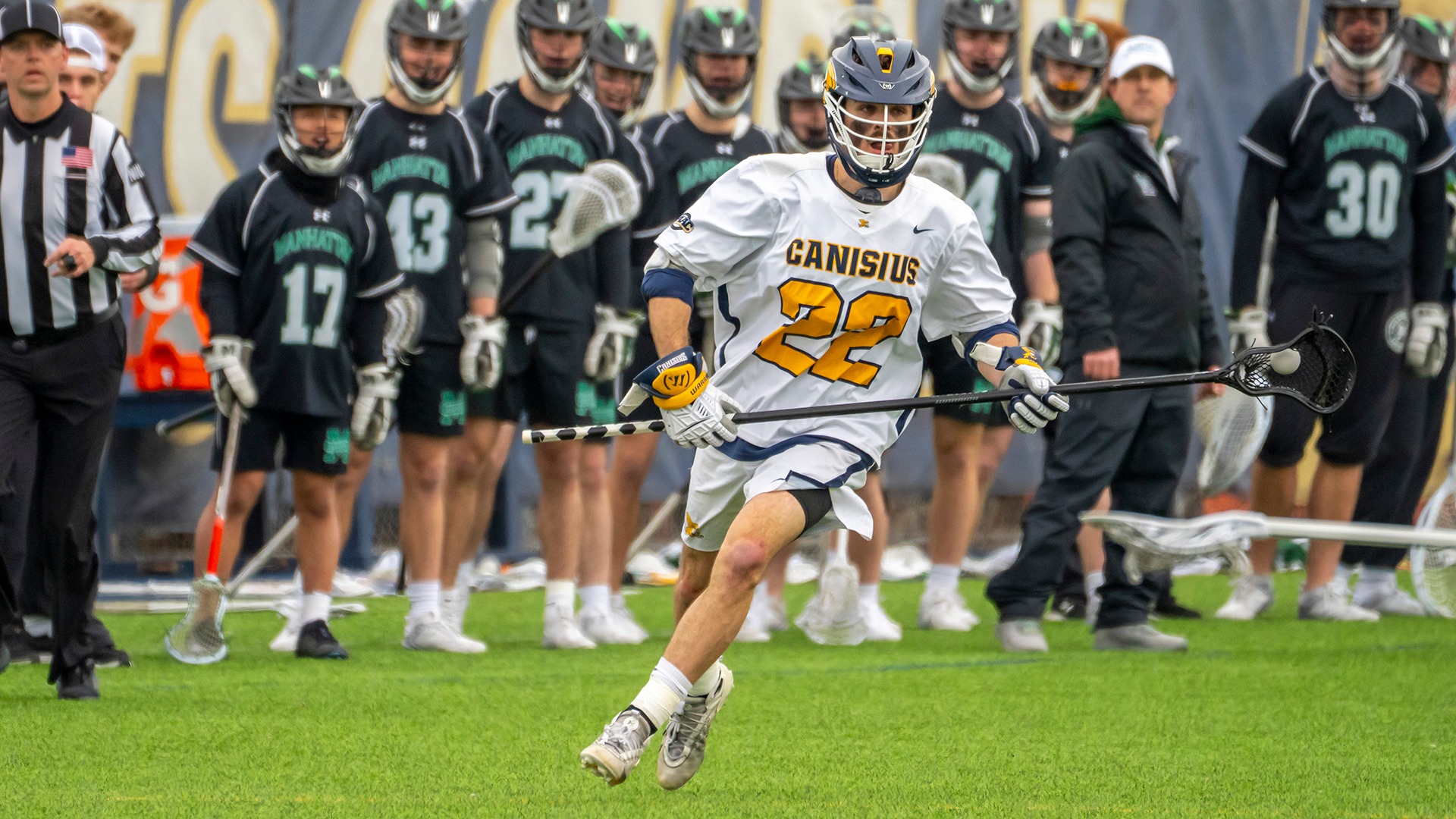 Canisius defenseman Alexis Simard is shown running with the ball during game action against Manhattan at the Demske Sports Complex on March 29, 2025