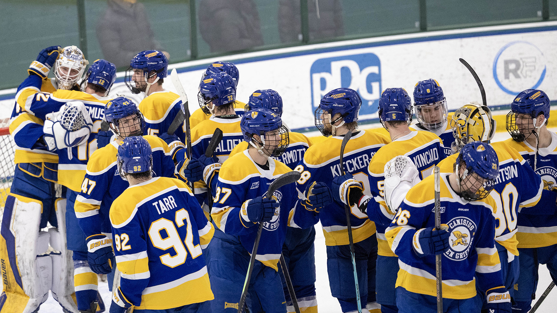 Members of the Canisius hockey team celebrate after defeating Mercyhurst, 5-0, at the Mercyhurst Ice Center in Erie, Pa. 