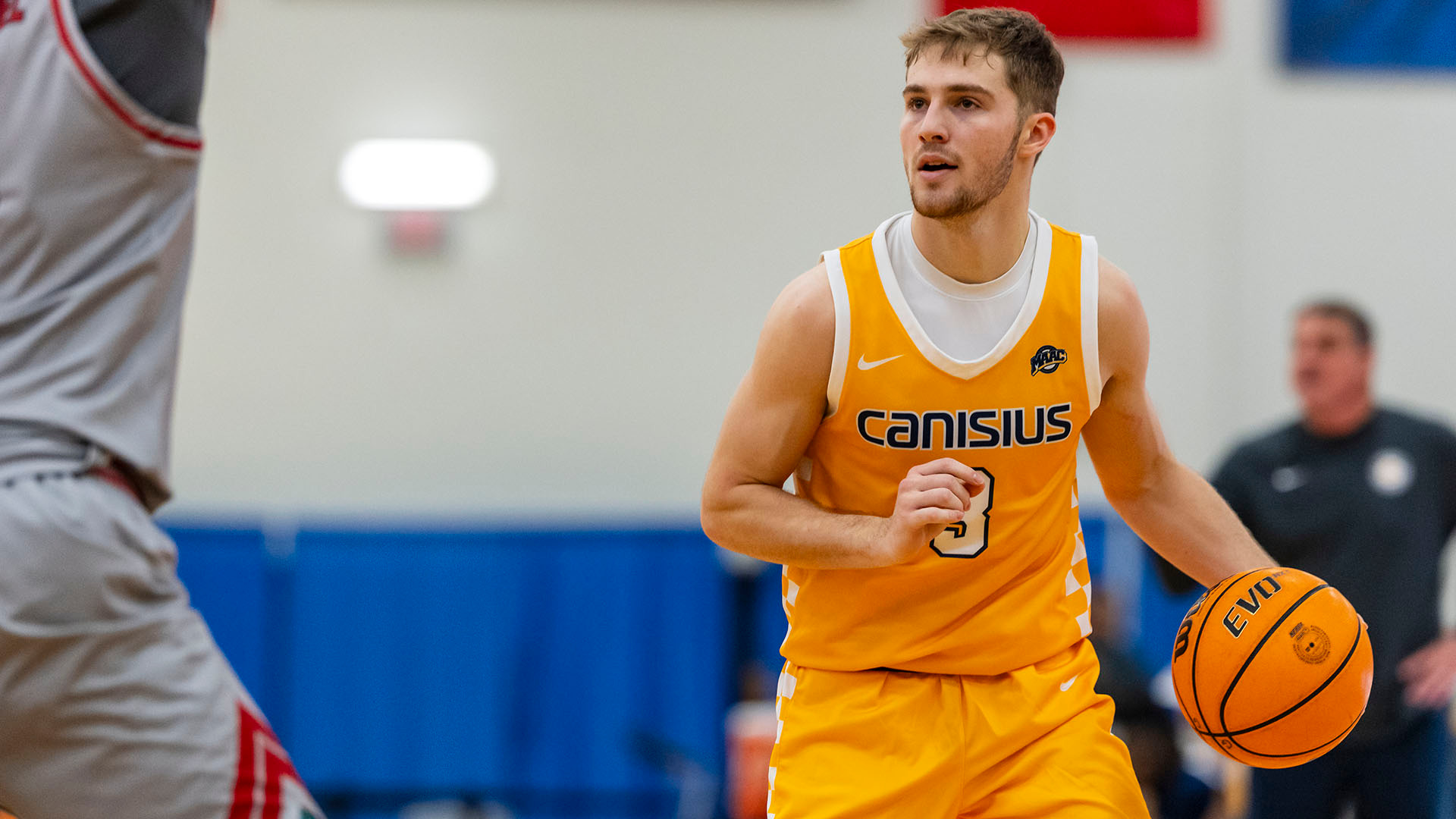 Anthony Benard looks to make a pass in the first half of a home game against Sacred Heart on Jan. 4, 2026.