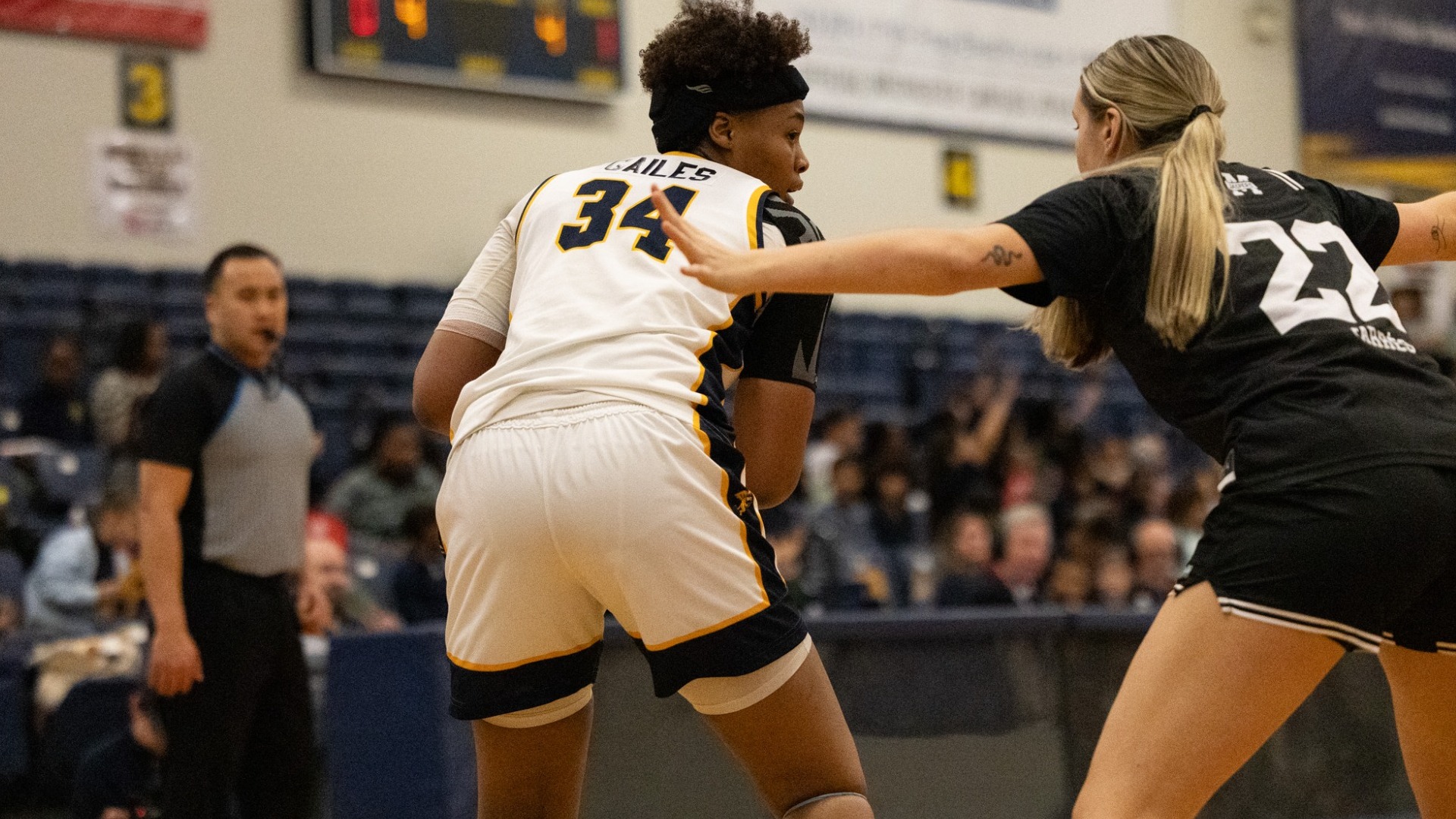 Shariah Gailes battles a Manhattan defender during a kids day game on Thursday, January 8th 2025.