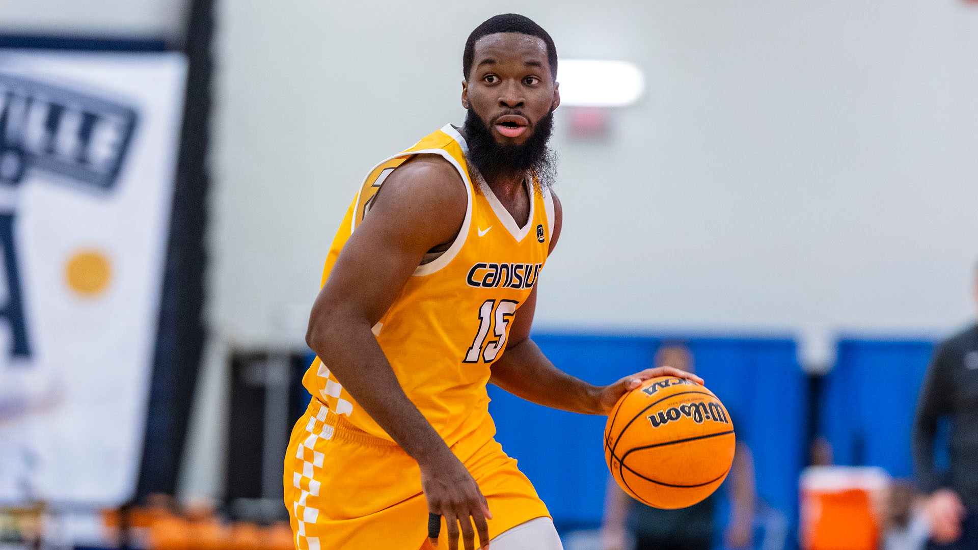 Mike Evbagharu looks to move the ball in a home game against Sacred Heart at home on Jan. 4, 2026.