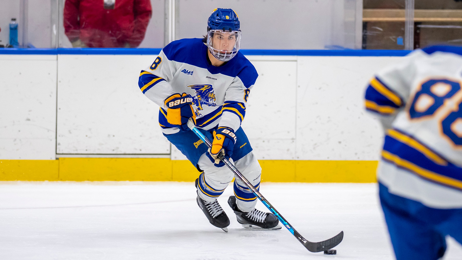 Canisius forward Rhys Chiddenton is shown skating with the puck during game action versus Ferris State at LECOM Harborcenter on Oct. 2, 2026