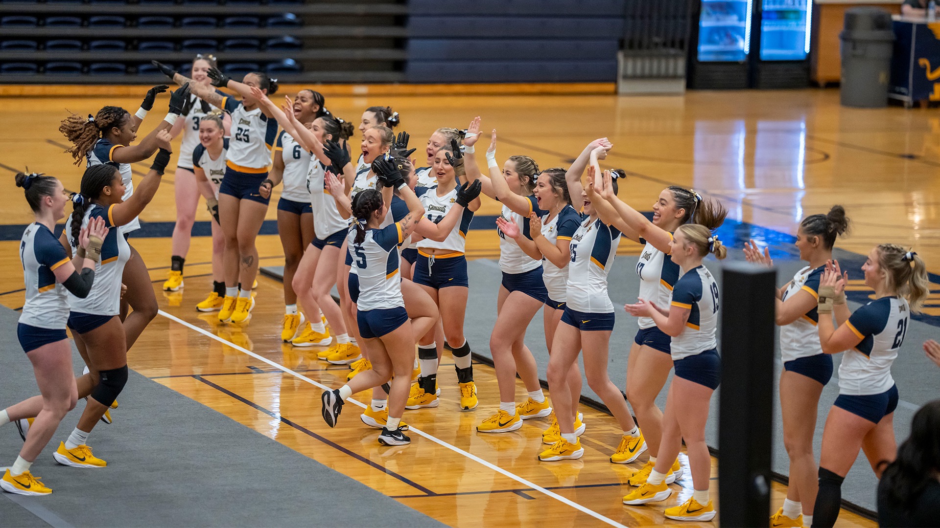 Acrobatics and Tumbling team celebrates after a competition