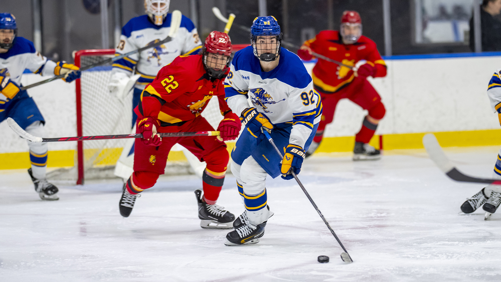 Canisius forward Ben Brunelle skates with the puck during game action versus Ferris State at LECOM Harborcenter on Oct. 2, 2026