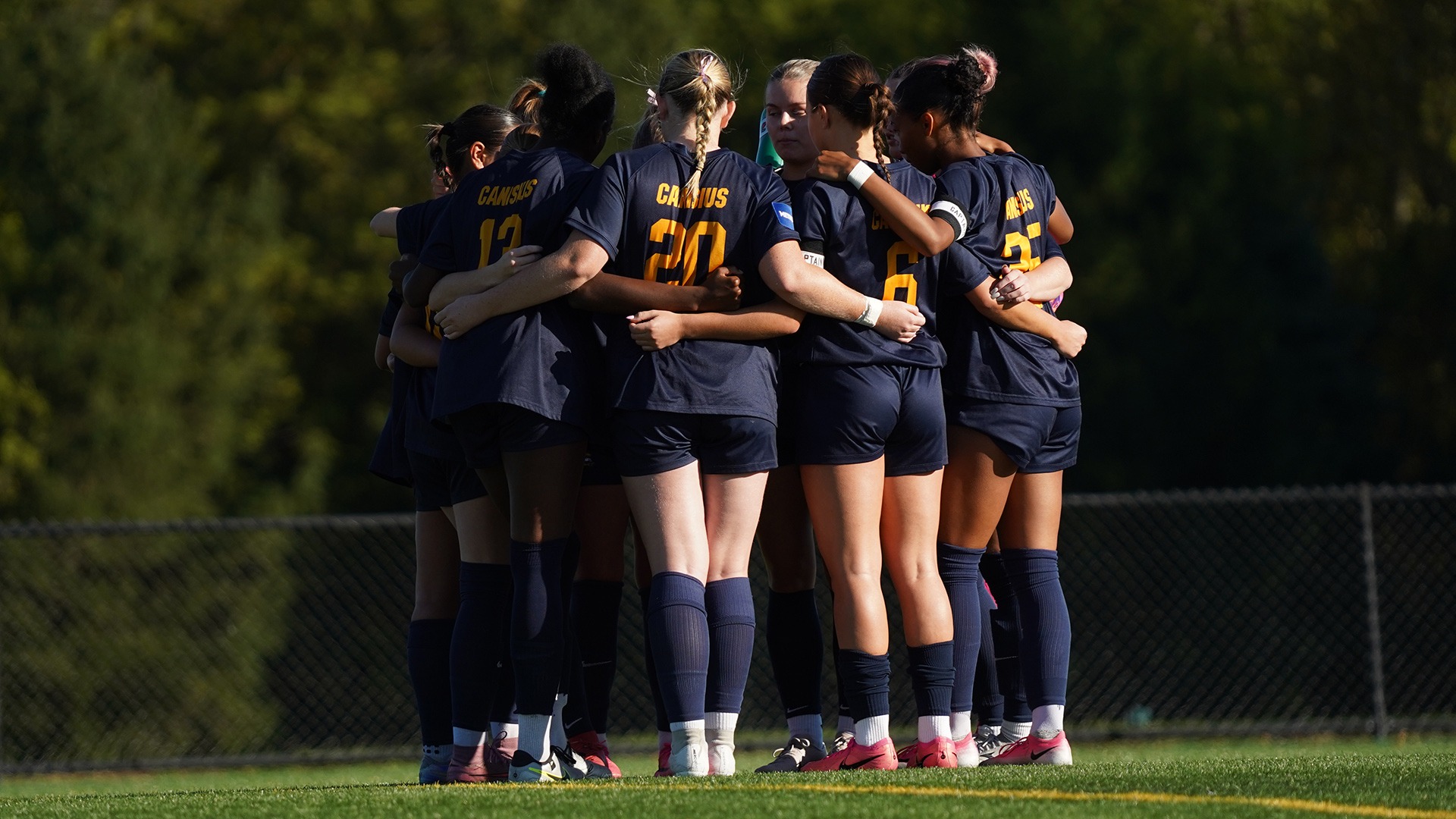 Members of the Canisius women's soccer team huddle on the field during game action at Siena on Oct. 7, 2026