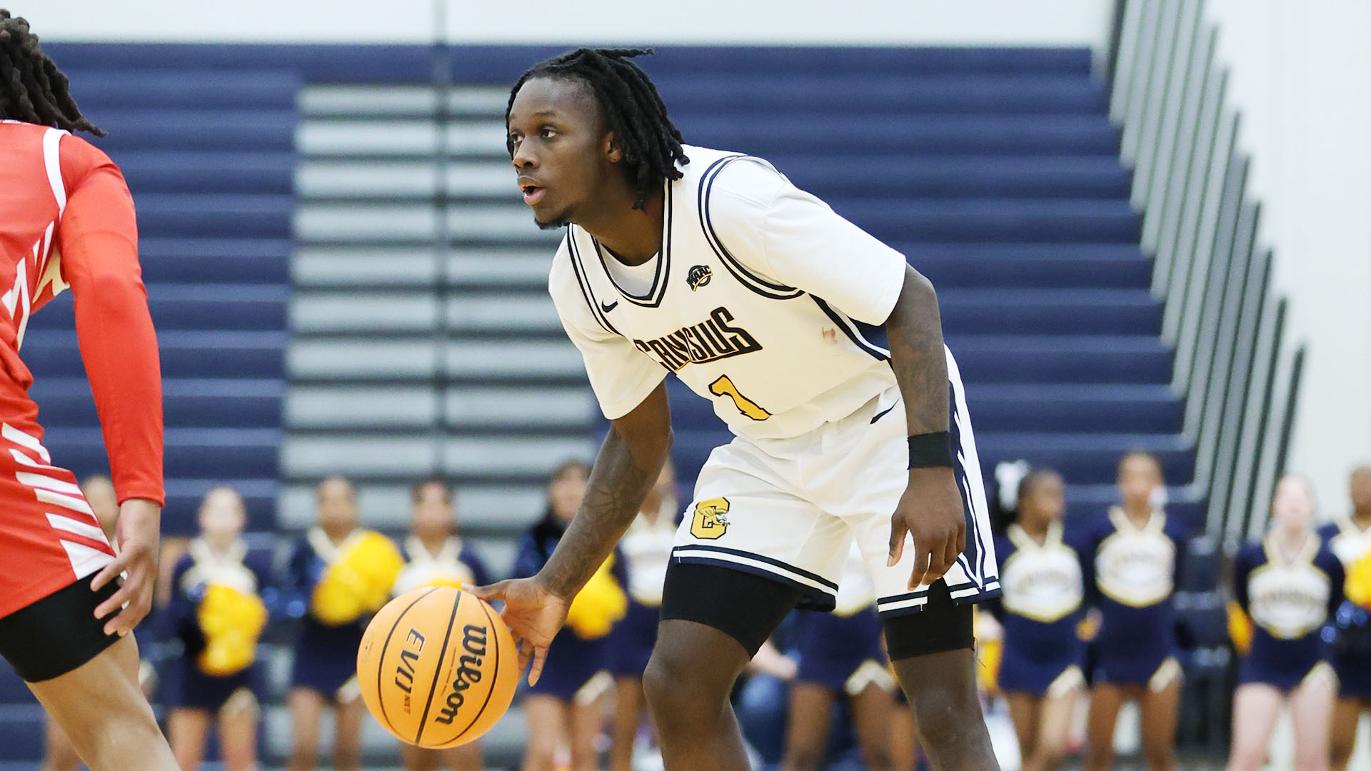 Javante Edwards looks to make a pass in the first half of a home game against Marist on Jan. 30, 2026.