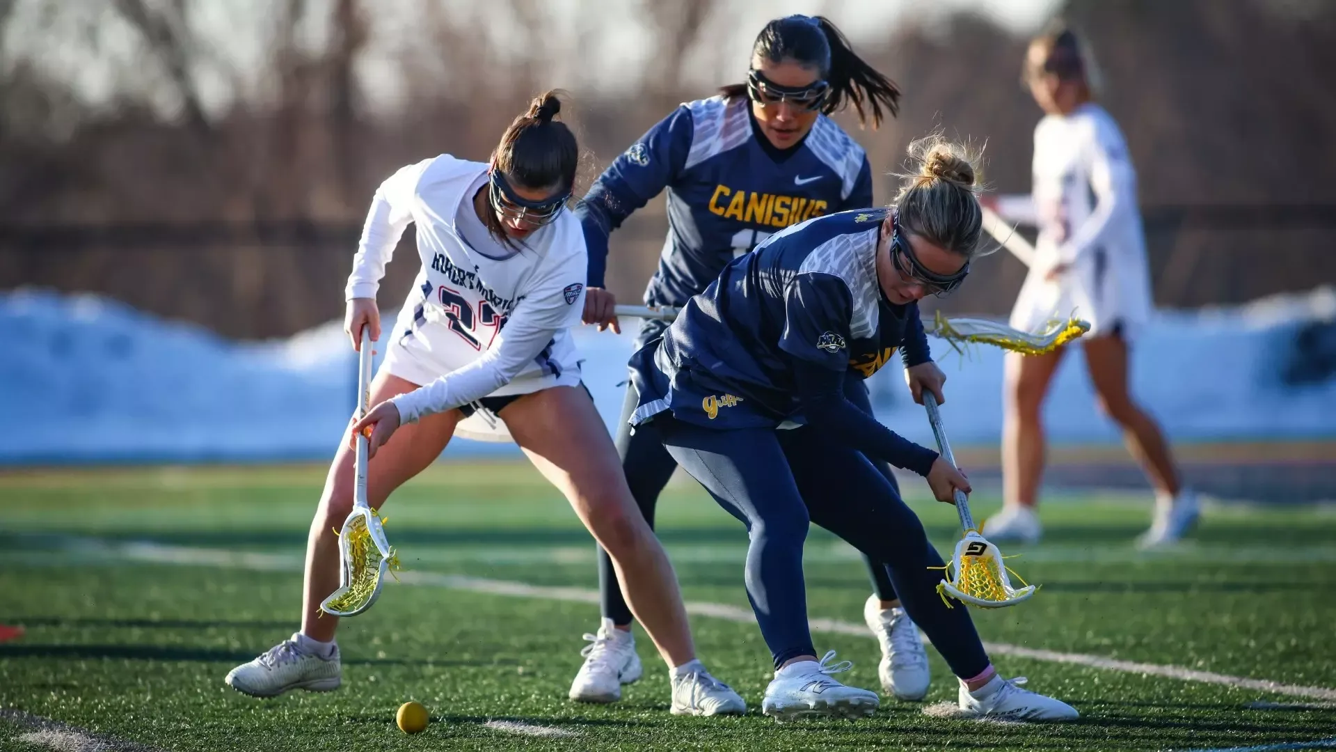 Maddie Thore battles for a ground ball at Robert Morris.