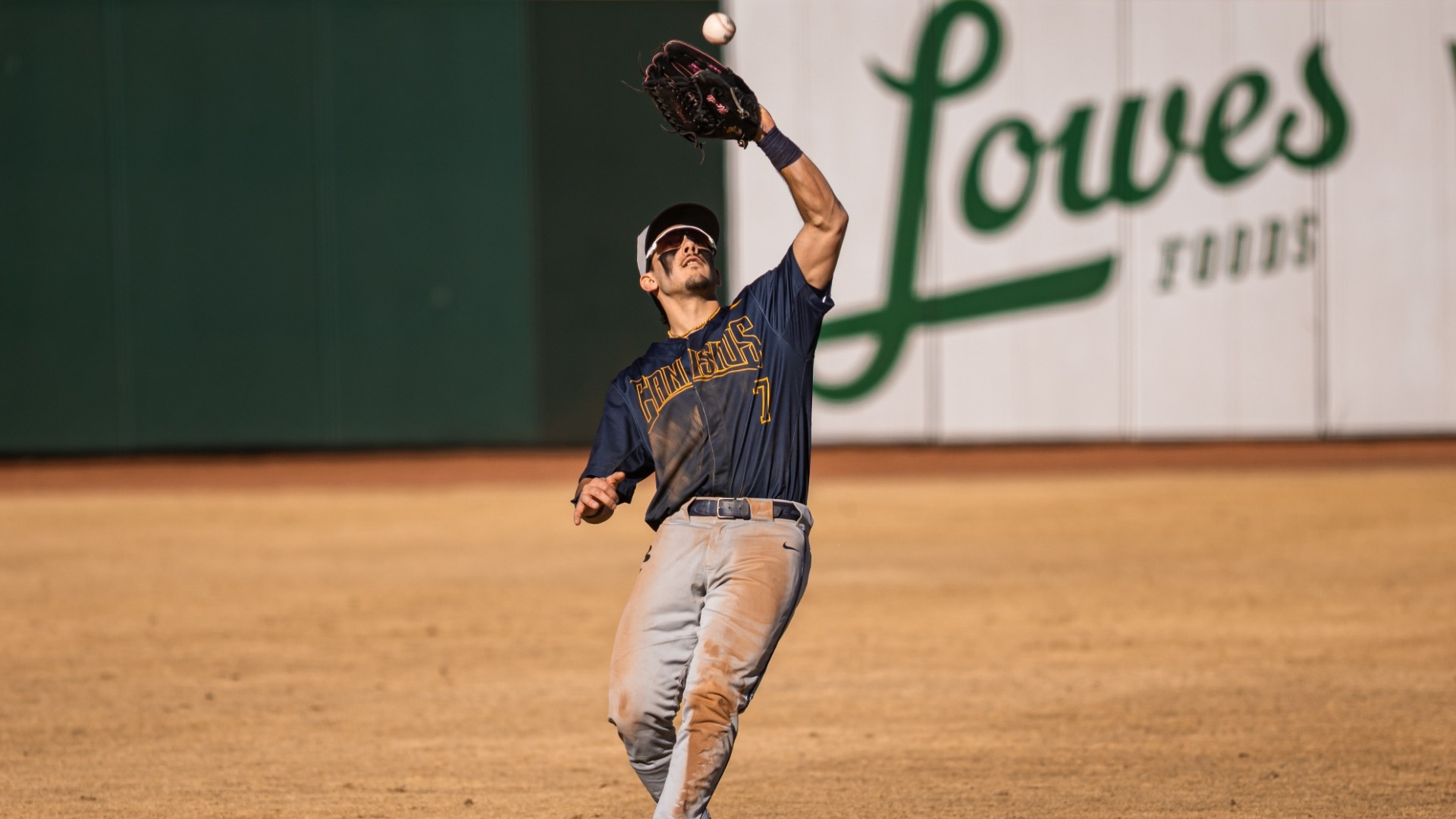 Andrew Marcello fields a fly ball in the team's first game at Appalachian State - Feb. 13, 2026 