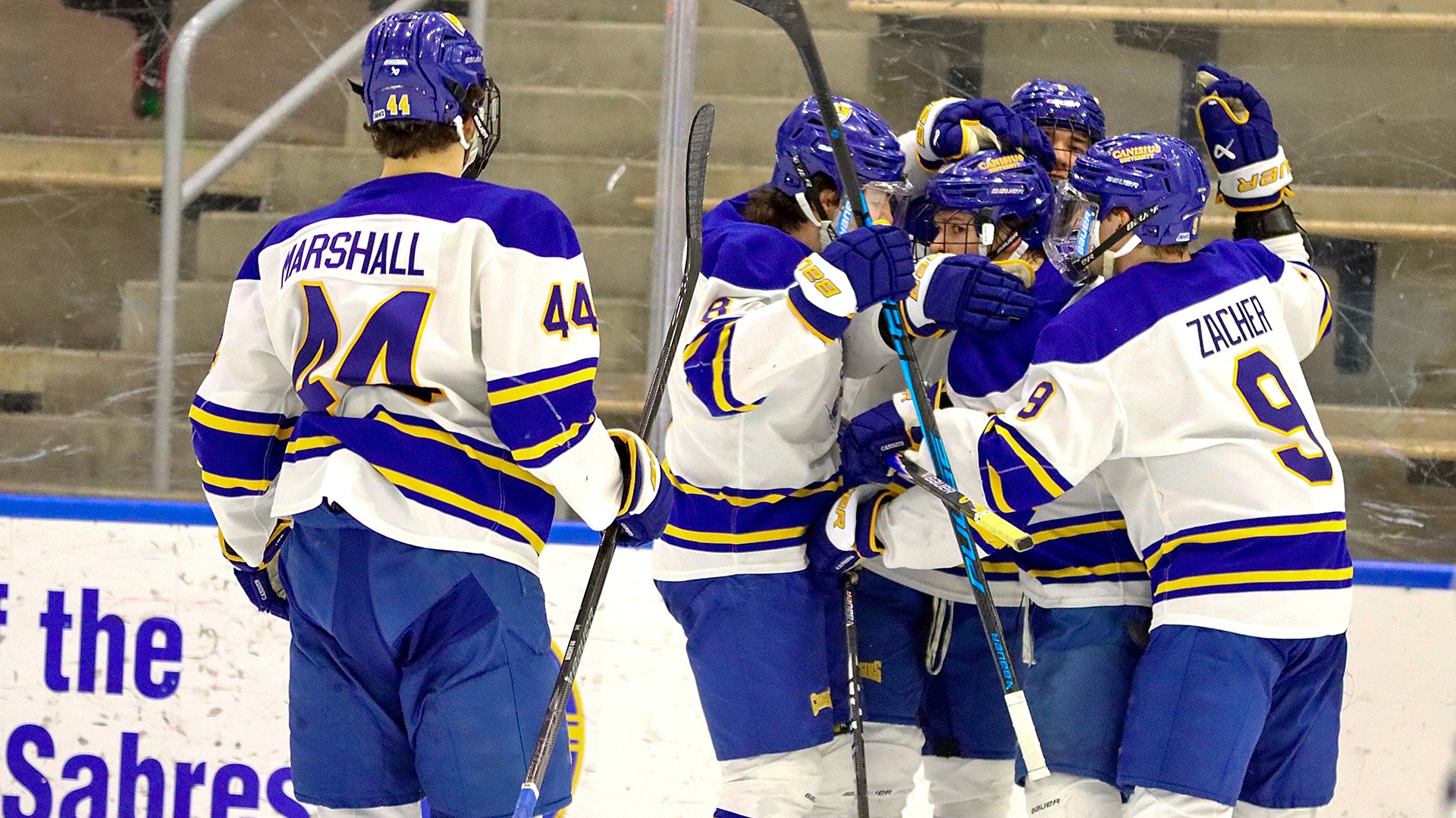 Members of the Canisius hockey team celebrate after scoring a goal during the Griffs 5-3 victory over Holy Cross at LECOM Harborcenter on Feb. 14, 2026