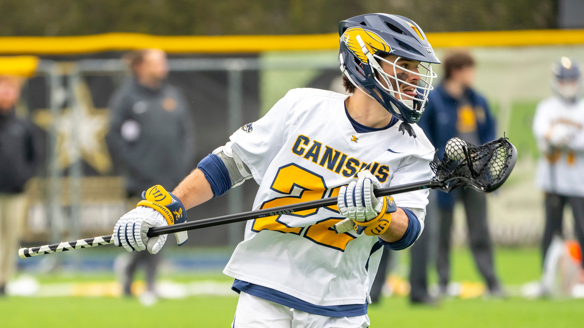 Canisius defenseman Alexis Simard is shown running with the ball in game action at the Demske Sports Complex on March 29, 2025