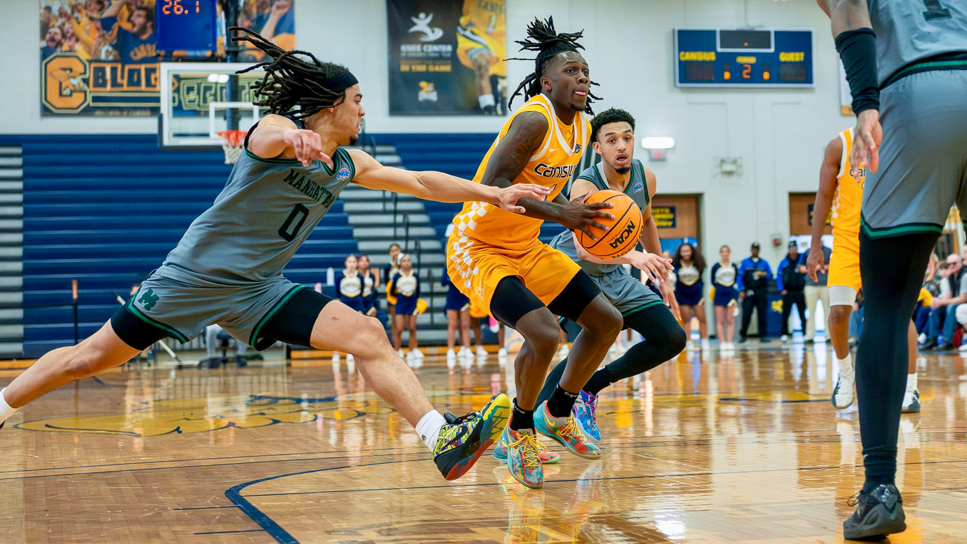 Javante Edwards slashes to the basket in a home game against Manhattan on Feb. 15, 2026.