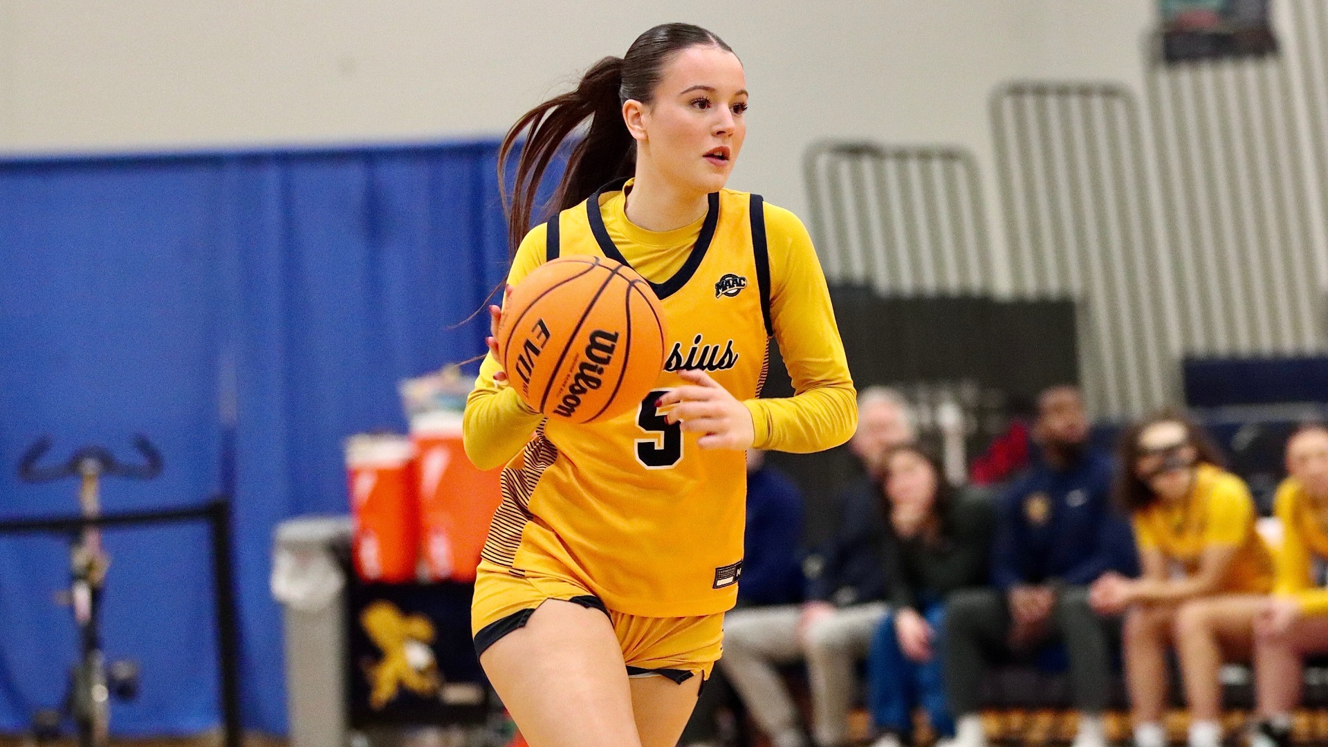 Irene Rey Pineda dribbles the ball versus Rider on Feb. 19 at the Koessler Athletic Center in Buffalo, N.Y.