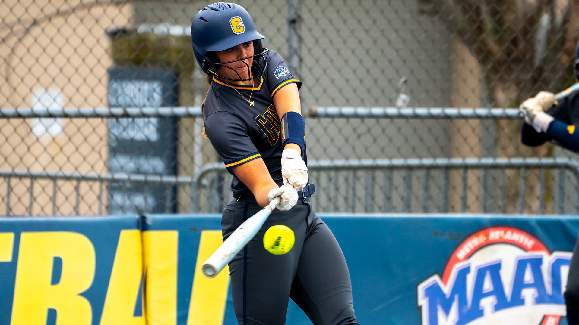 Rebecca Hai gets a base hit against Rider on April 4, 2025.