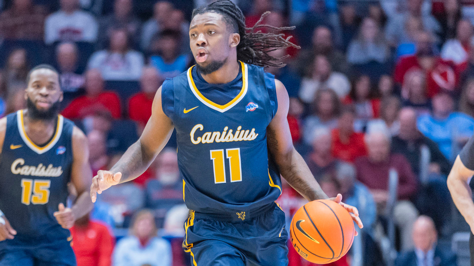 Kahlil Singleton brings the ball up the floor in the first half of a road game at Dayton on Nov. 3, 2025