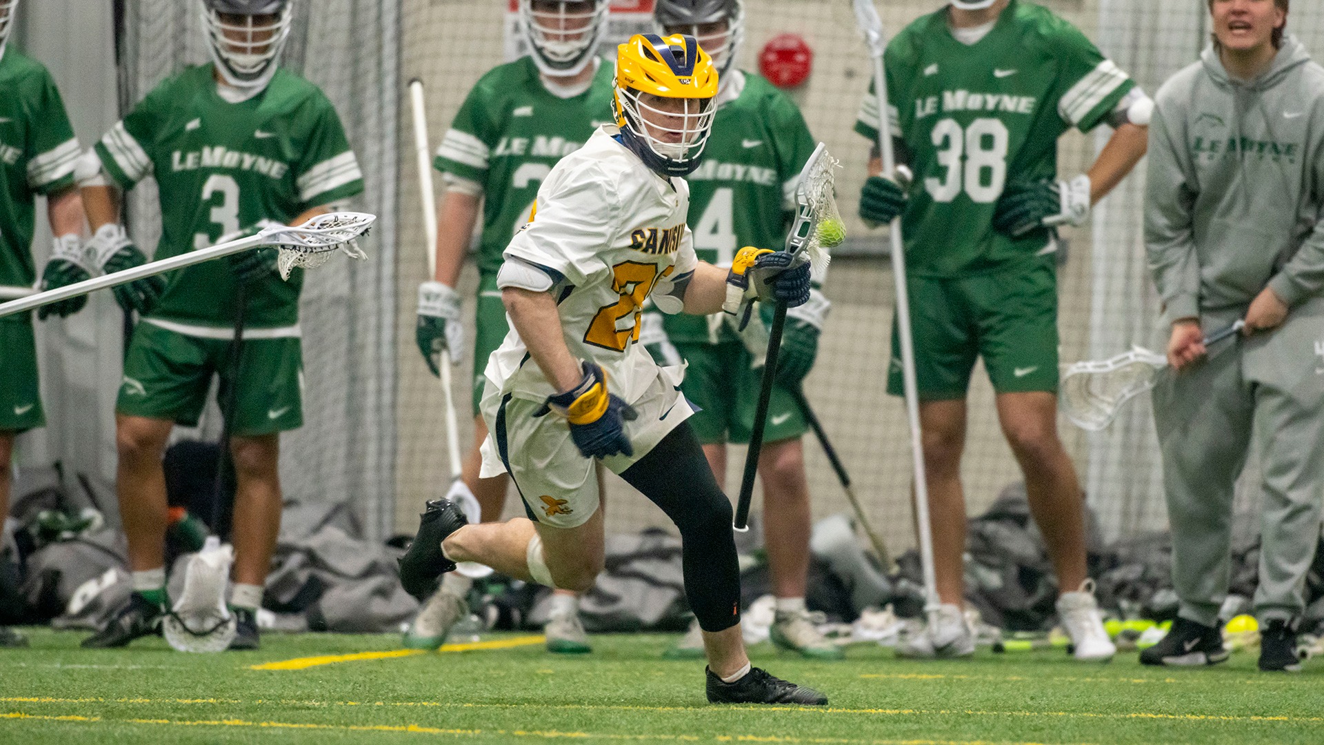 Canisius midfielder Quinn Huber is shown running with the ball during game action against Le Moyne at Sahlen's Sports Park in Elma, N.Y.