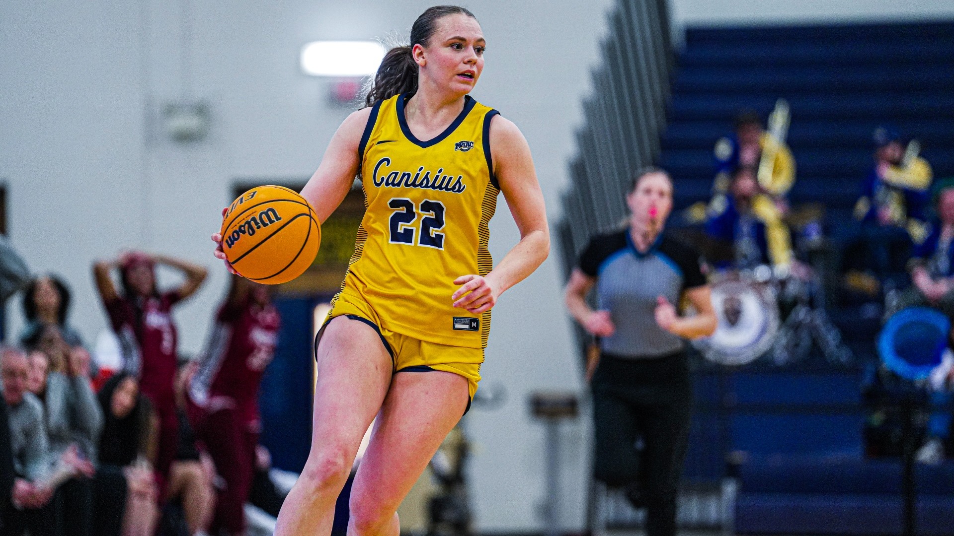 Franka Wittenberg dribbles a ball versus Rider at the Koessler Athletic Center.