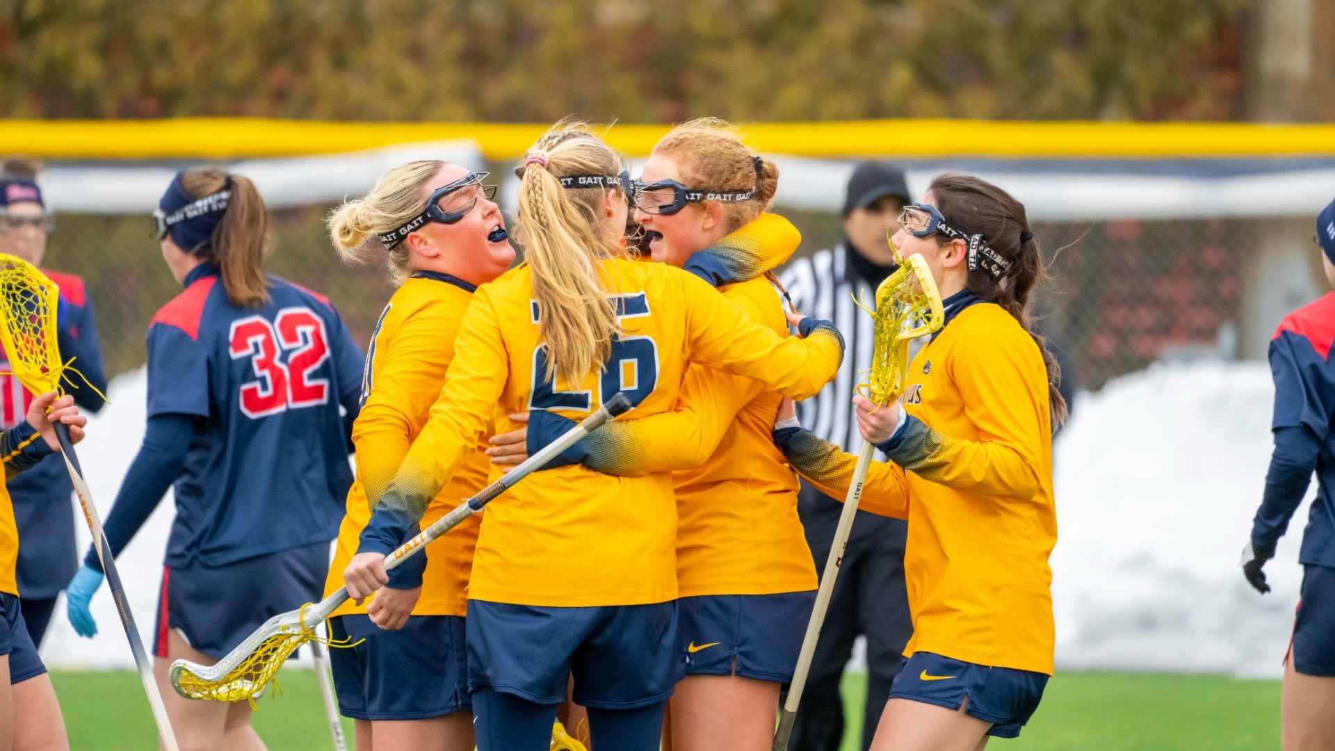 The team celebrates a goal from Annie Chimienti at the Demske Sports Complex in Buffalo, N.Y.
