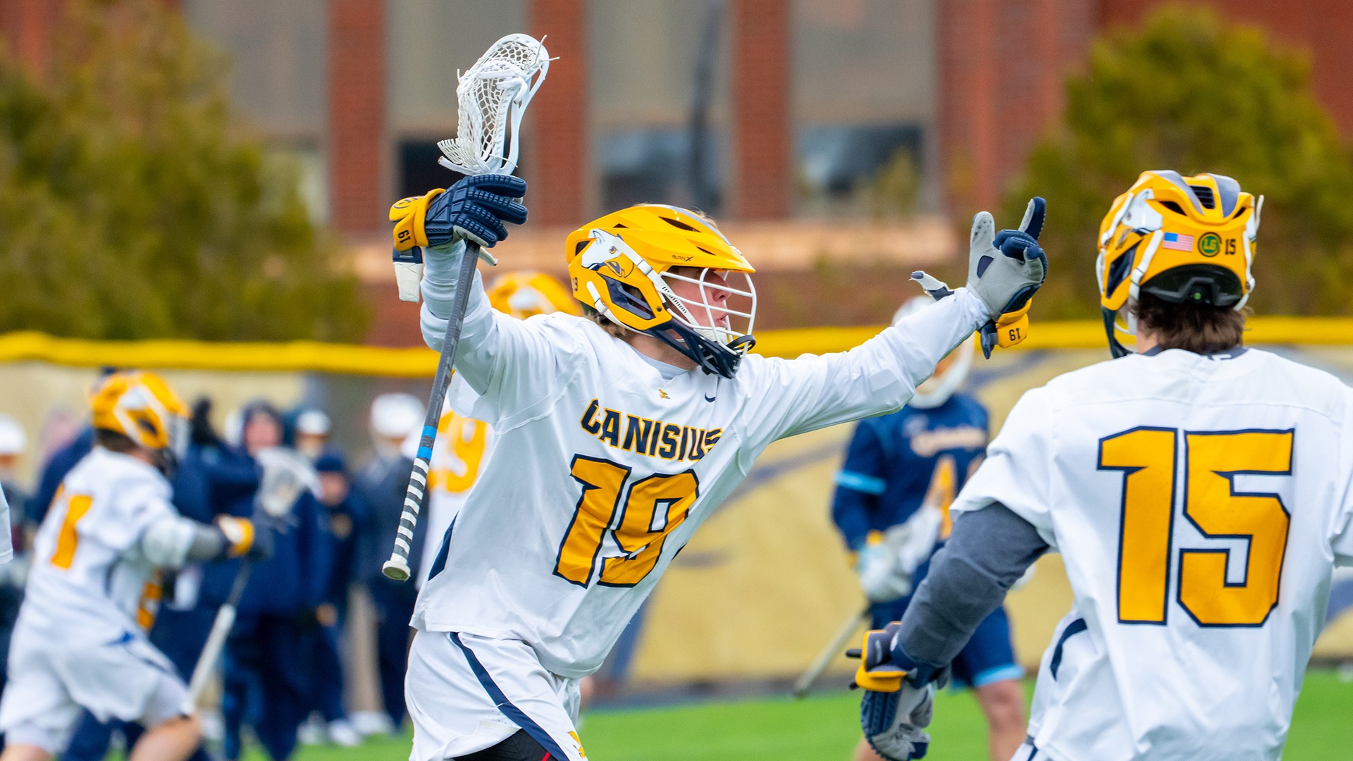 Canisius midfielder Dawson Wade celebrates after scoring the game-winning goal in the Griffs' 9-8 victory over Quinnipiac 