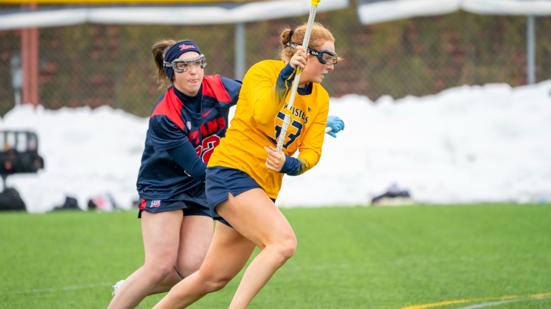 Makenna Crouse weaves past a defender against Detroit Mercy at the Demske Sports Complex in Buffalo, N.Y.