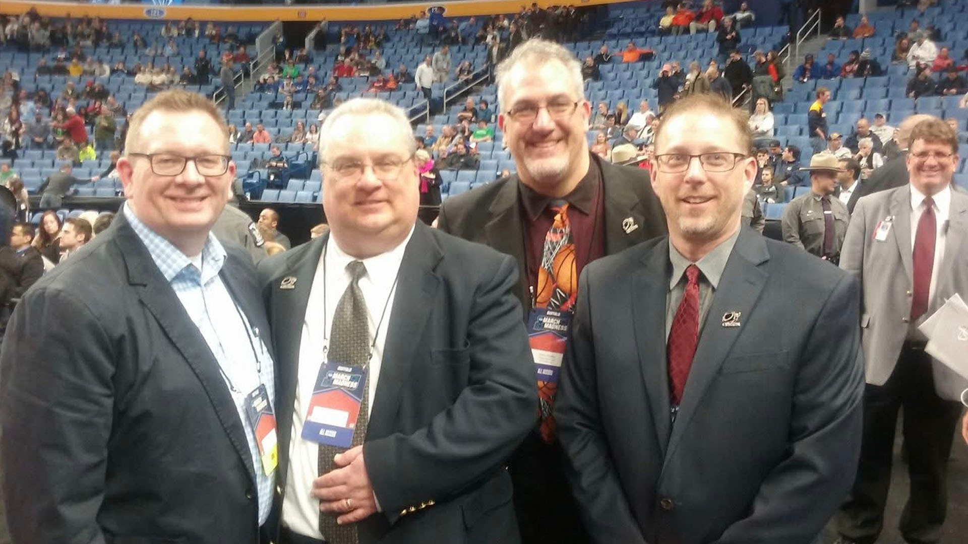 Canisius Basketball Stat Crew - from left to right - Mike Heim, Sam Hunt, Kevin Shelley, Dwayne Dewyea pose for a photo at the 2017 NCAA Men's Basketball Championship at KeyBank Center in Buffalo.