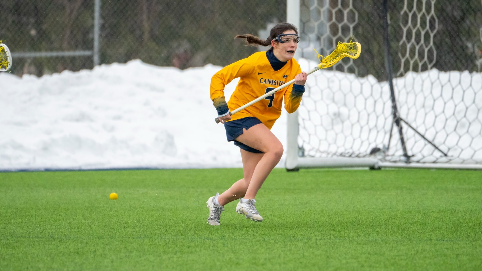 Meg Hiltz dodges a defender against Detroit Mercy at the Demske Sports Complex in Buffalo, N.Y.
