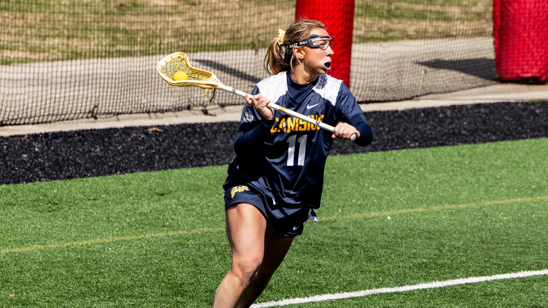 Megan Previdi looks to pass a ball against Fairfield at Rafferty Stadium in Fairfield, Conn.