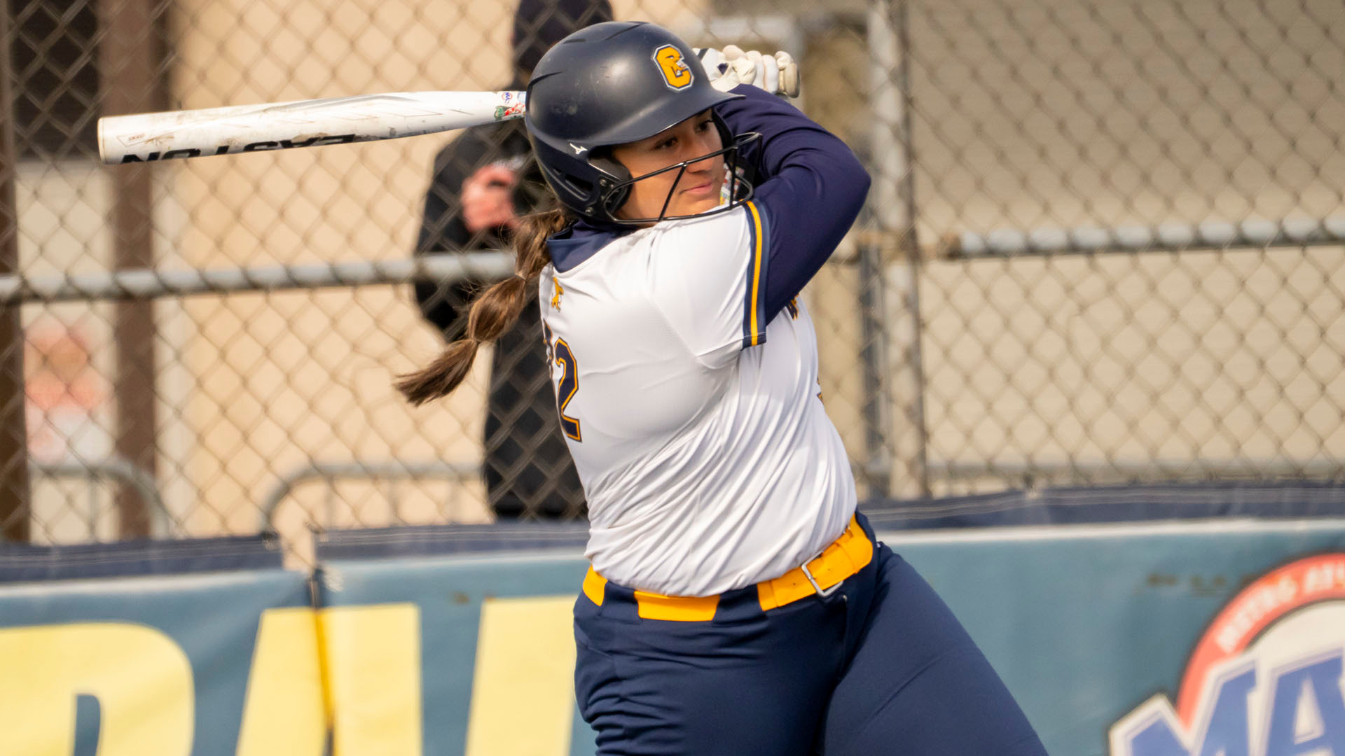 Sofia Escoto lines a pitch to right field in a home game against Siena on March 24, 2026.