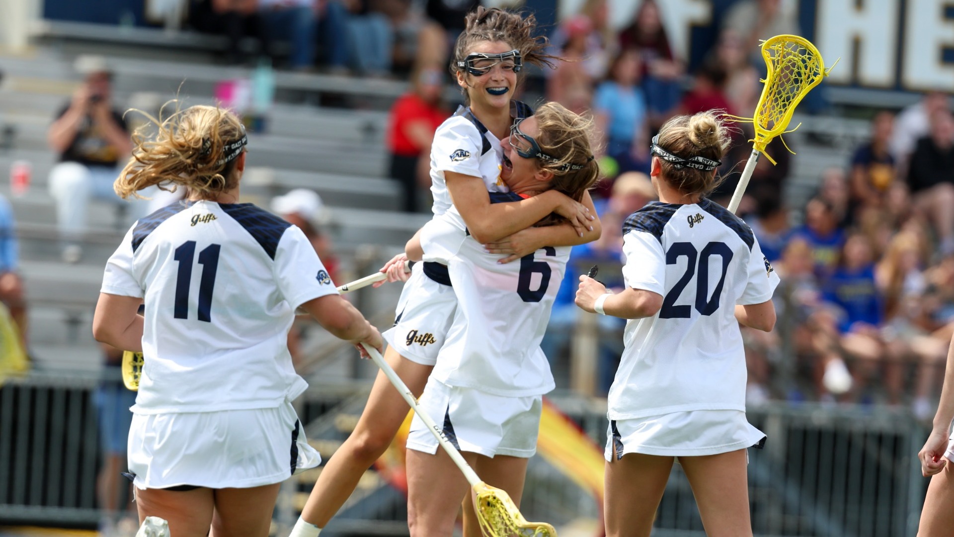 Ella Forcucci celebrates a goal with Maddie Fitzgerald
