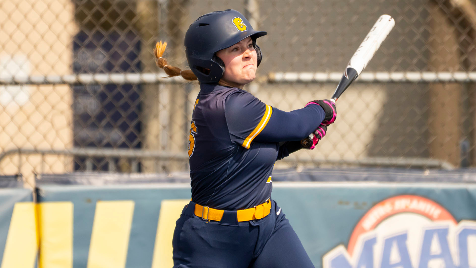 Grace Walker drives a ball to right field in a home game against Fairfield on March 29, 2026.