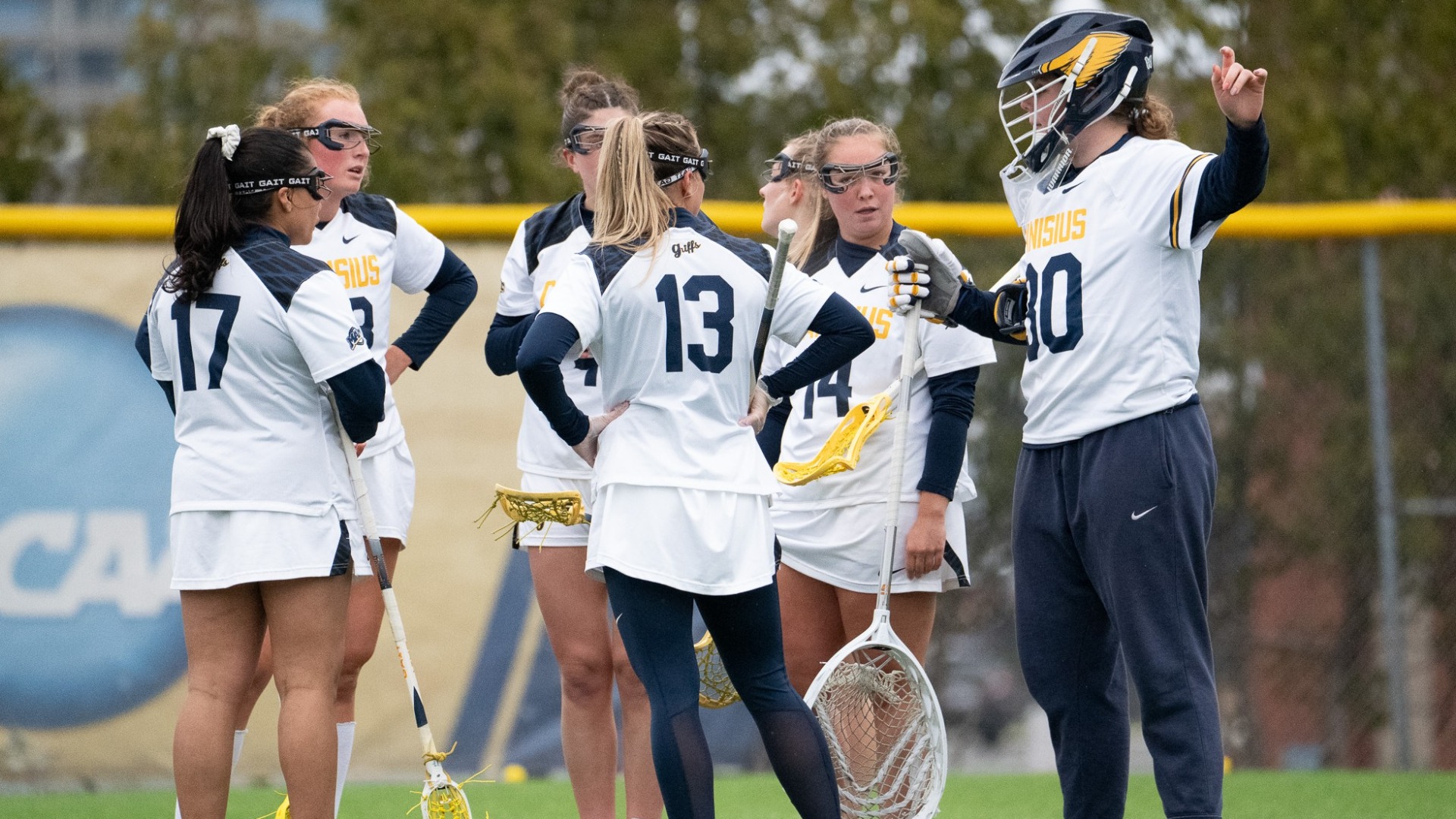 Team huddles against Niagara on Wednesday April, 1 at the Demske Sports Complex 