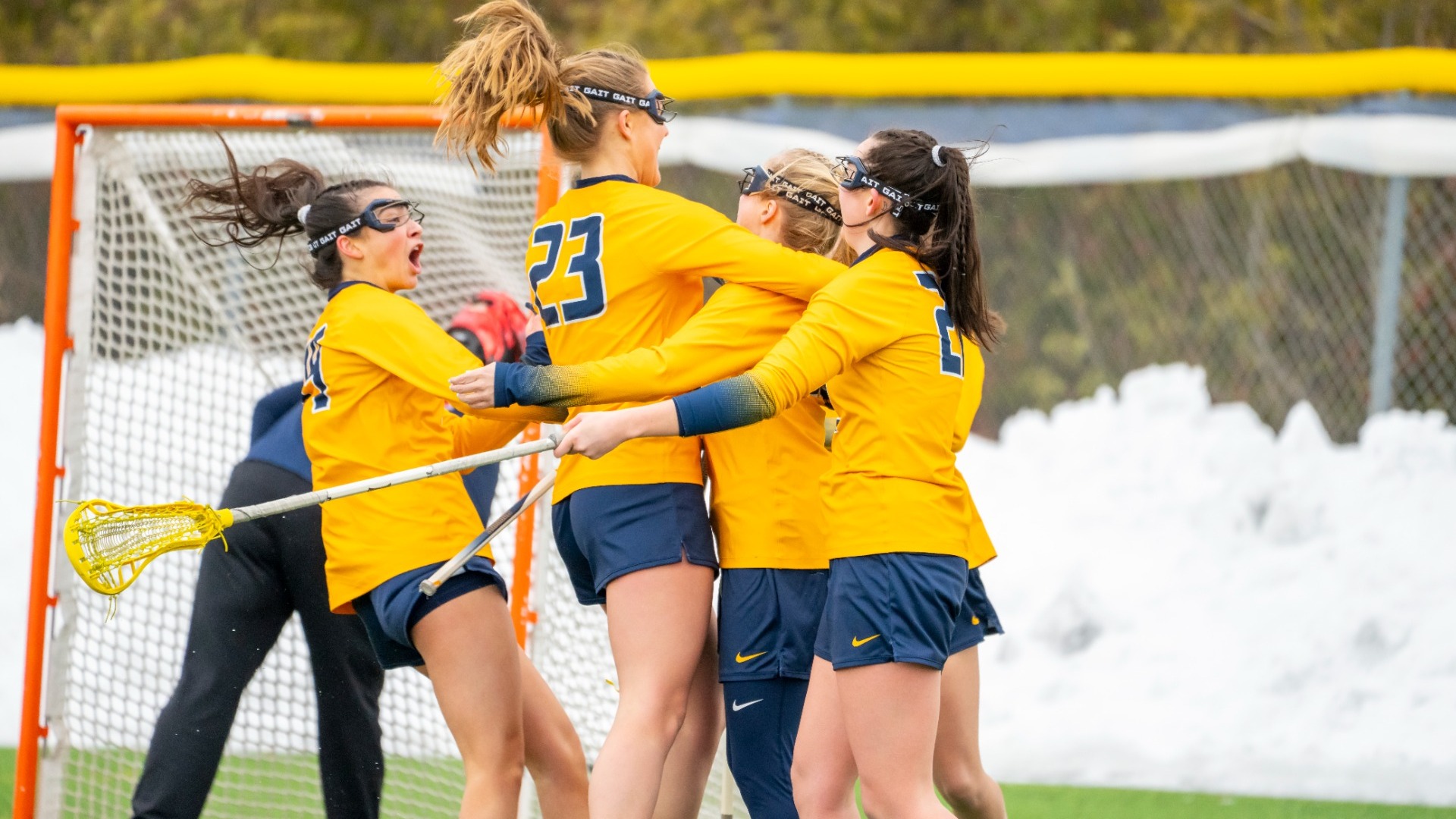 Team celebration after a goal against Detroit Mercy at the Demske Sports Complex in Buffalo, N.Y.