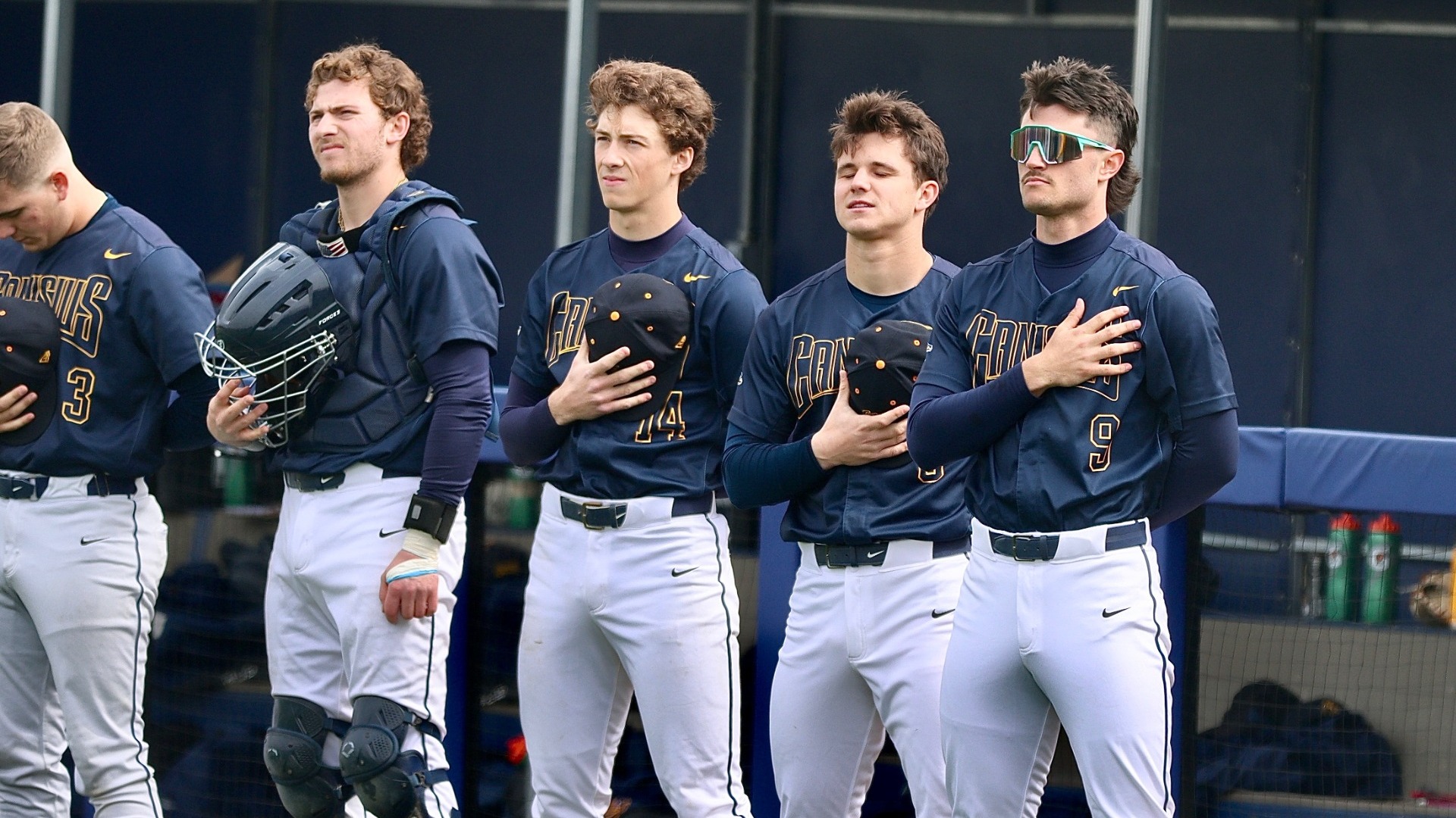Thomas Zwirecki, Tyson Kaufman, Bennett Cox, and Owen Silliman line up for the national anthem against Saint Peter's - April 3, 2026