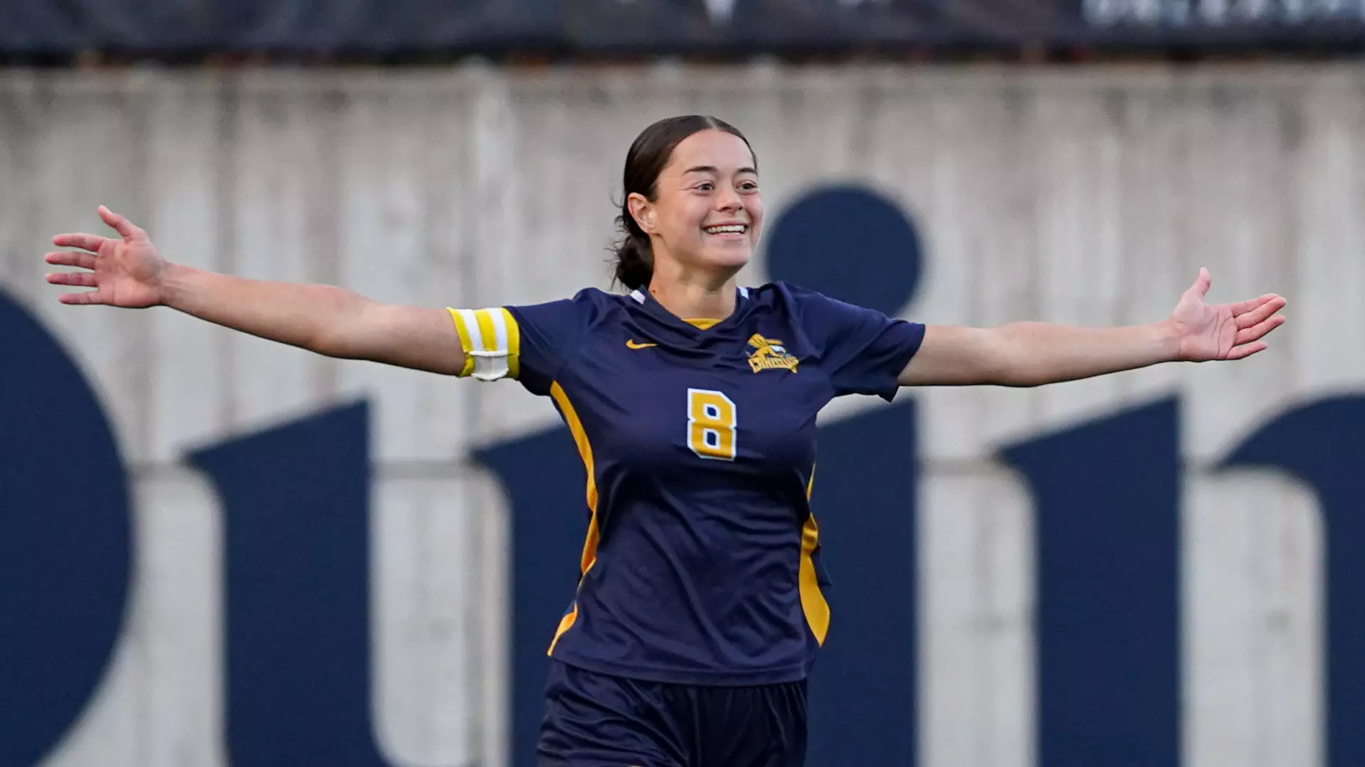 Canisius midfielder Lizzy Harkness celebrates after scoring the decisive kick in the Griffs penalty-kick victory over Quinnipiac at the Quinnipiac Soccer and Lacrosse Stadium on Nov. 6, 2025