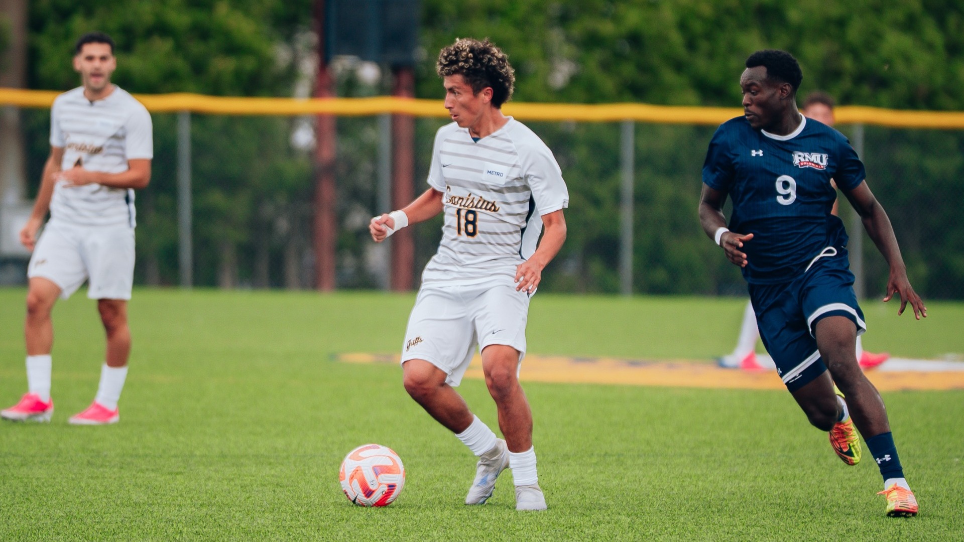Kerby Henao dribbles the ball vs. Robert Morris - Aug. 23, 2026