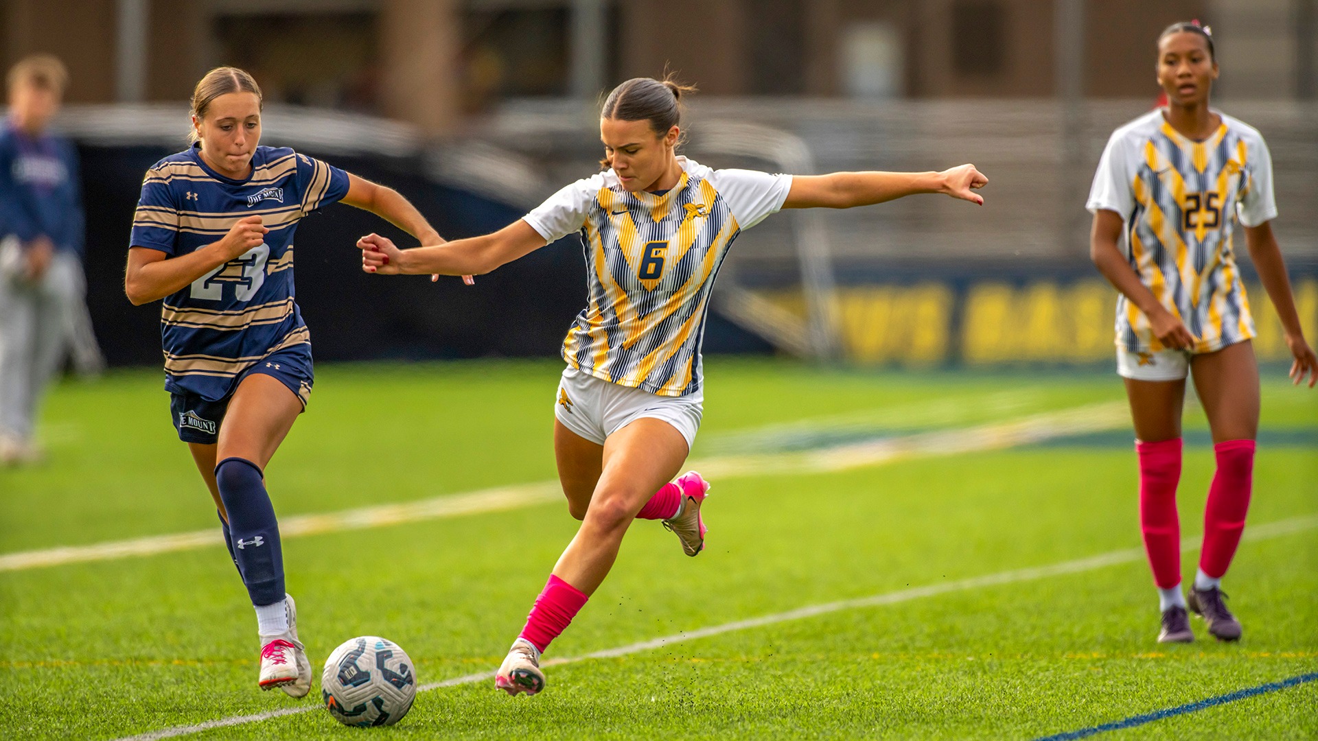 Canisius midfielder Jessica Whitaker kicks the soccer ball during game action versus Mount St. Mary's at the Demske Sports Complex during the 2025 season