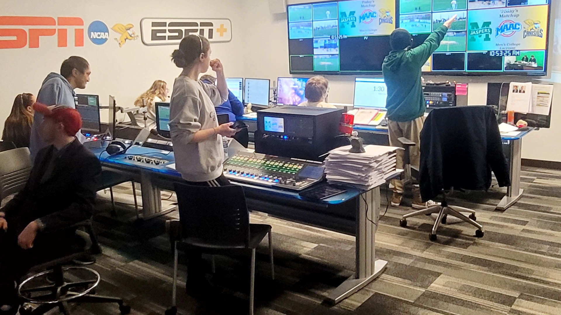 Students from the Golden Griffin Broadcast Network work in the ESPN Control Room helping produce a home sporting event in March of 2026.
