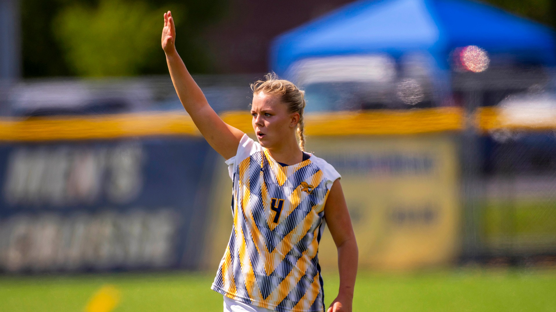 Canisius junior midfielder Ava Pickard raises her hand to signal her readiness to restart play during game action versus Sacred Heart at the Demske Sports Complex on Sept. 6, 2026