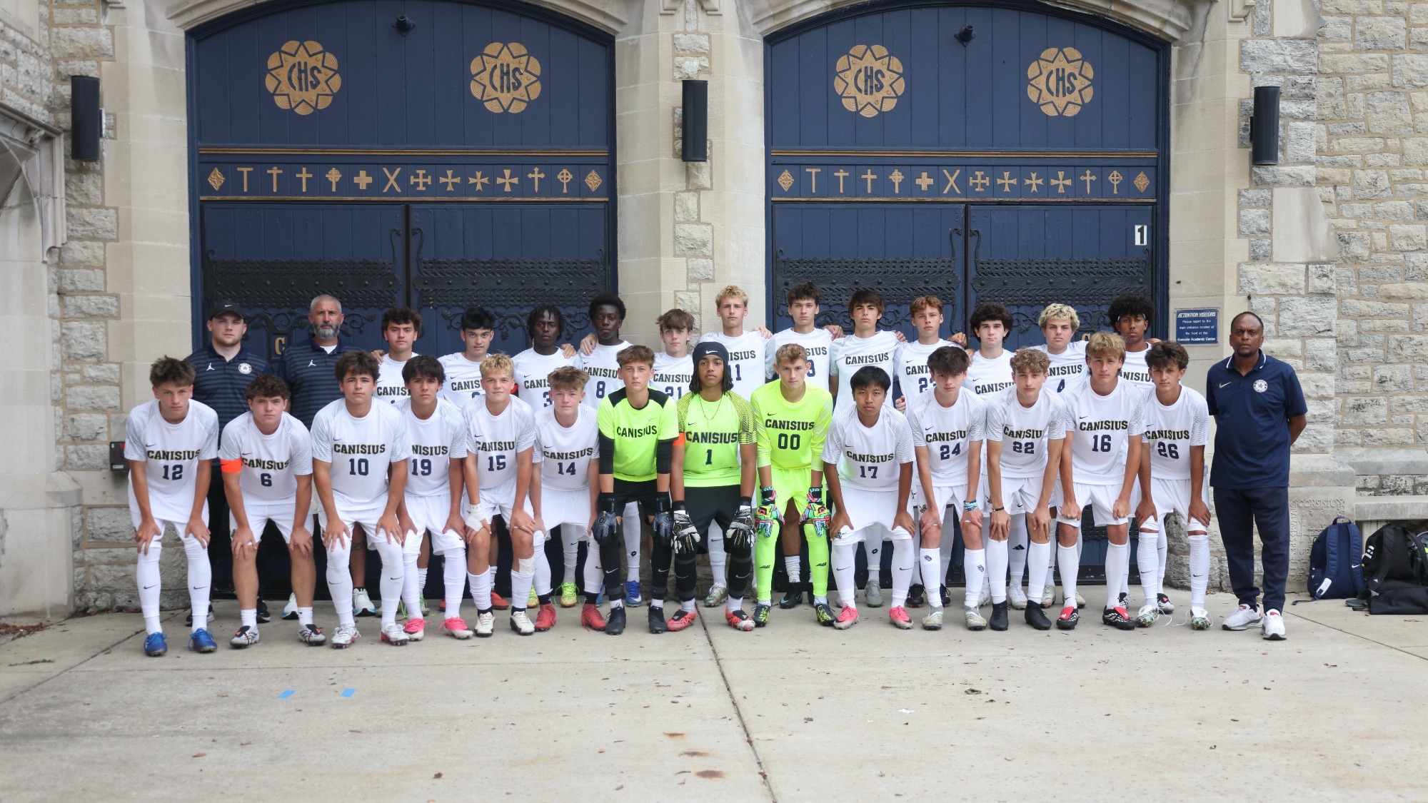 CHS Soccer team photo 2026 in front of Blue Doors