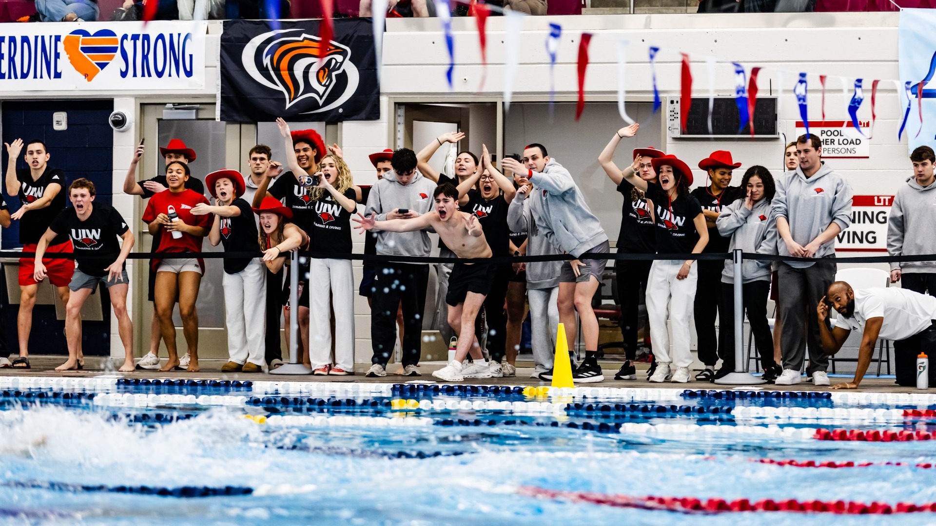 Swim team cheer side of pool
