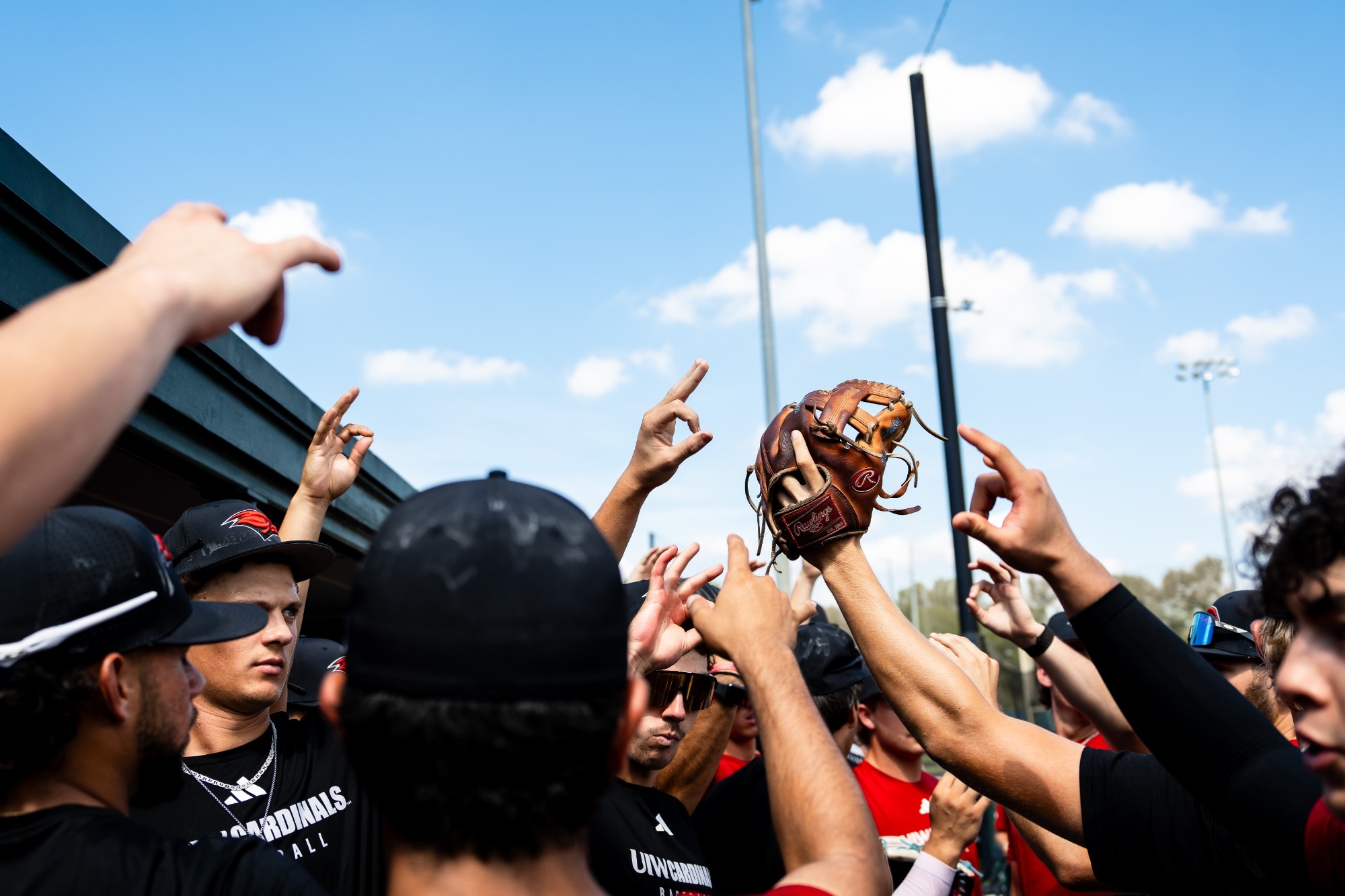 Baseball huddles at practice