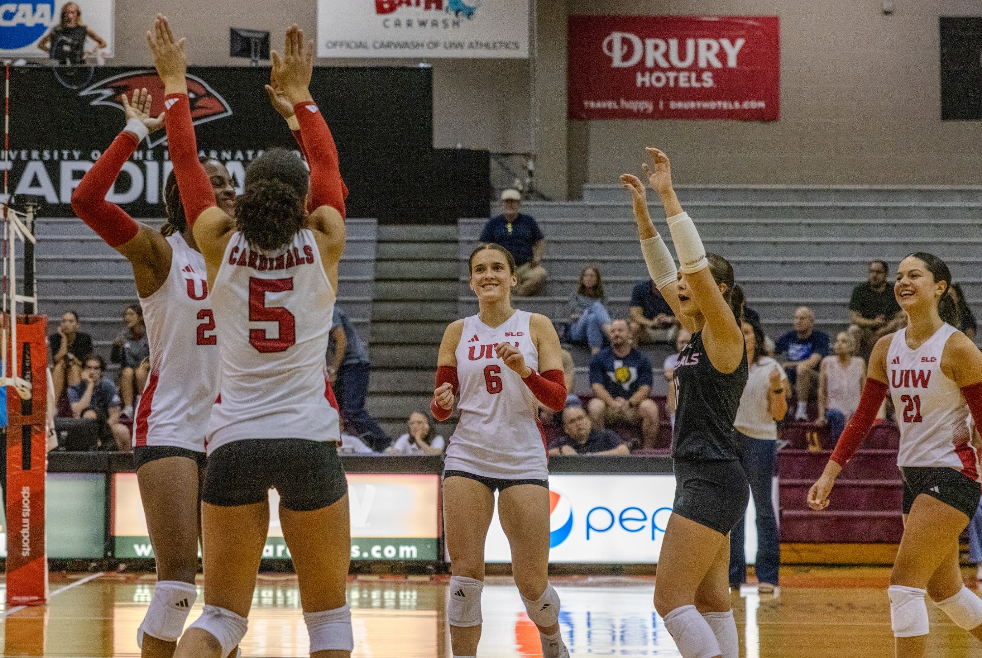 Volleyball celebrates at home