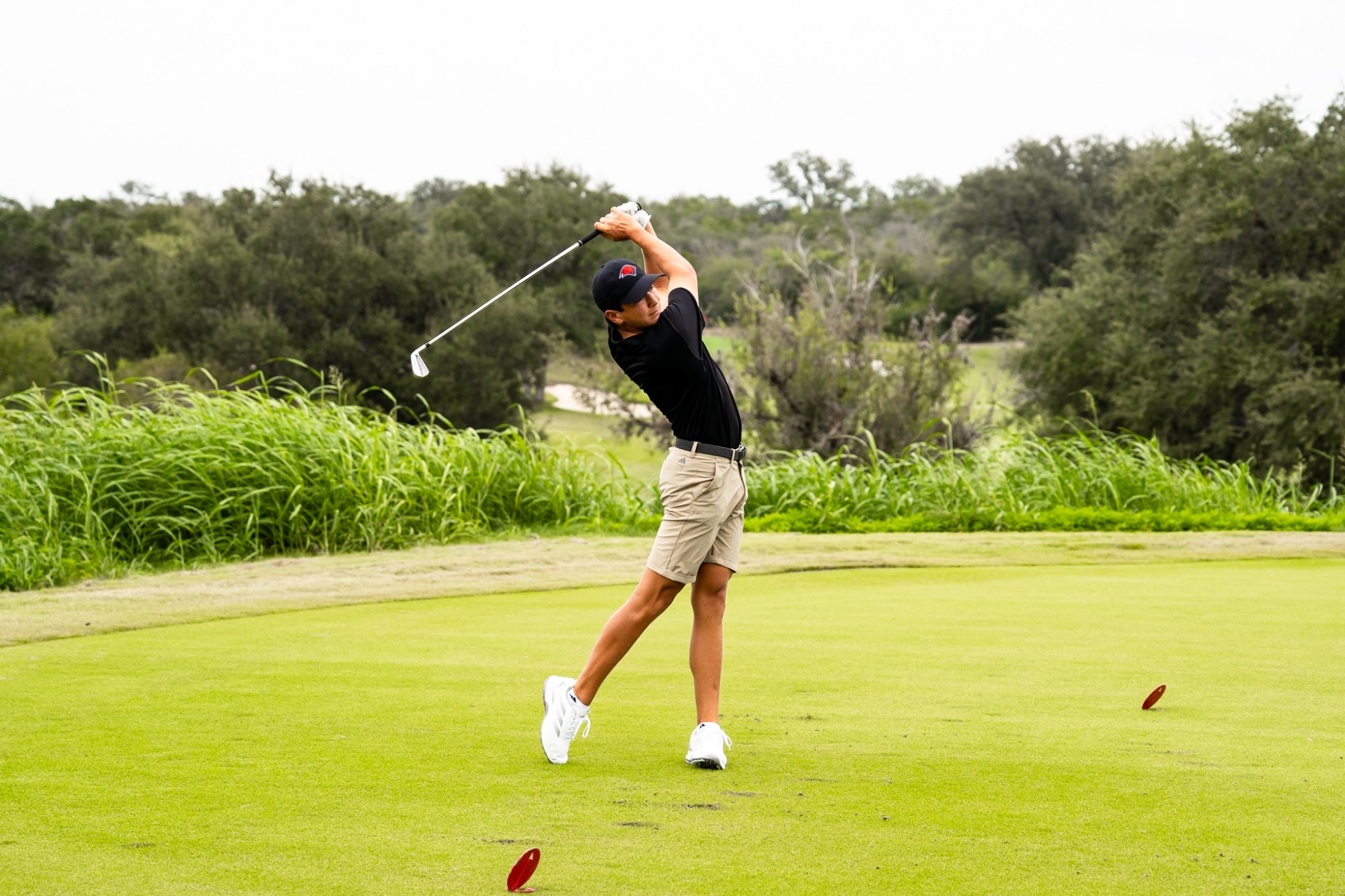 Mangione tees off
