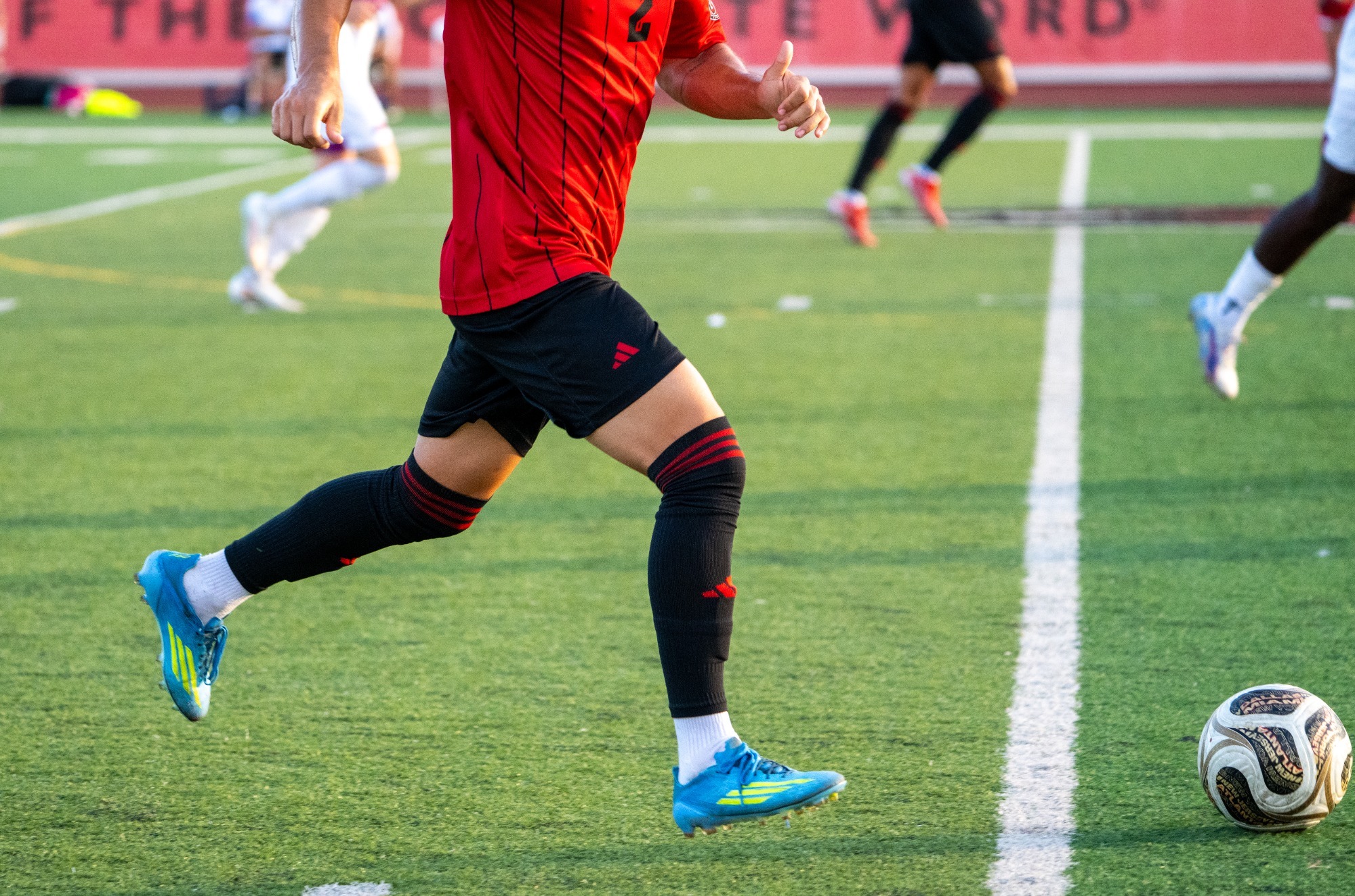 Bryce Tober runs down the field with the ball