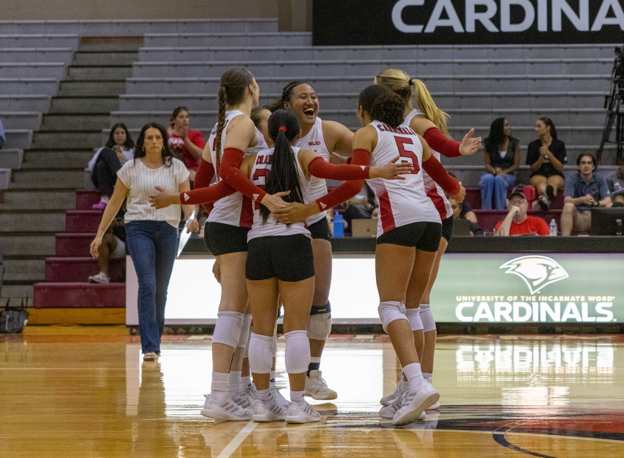 Volleyball celebrates at home